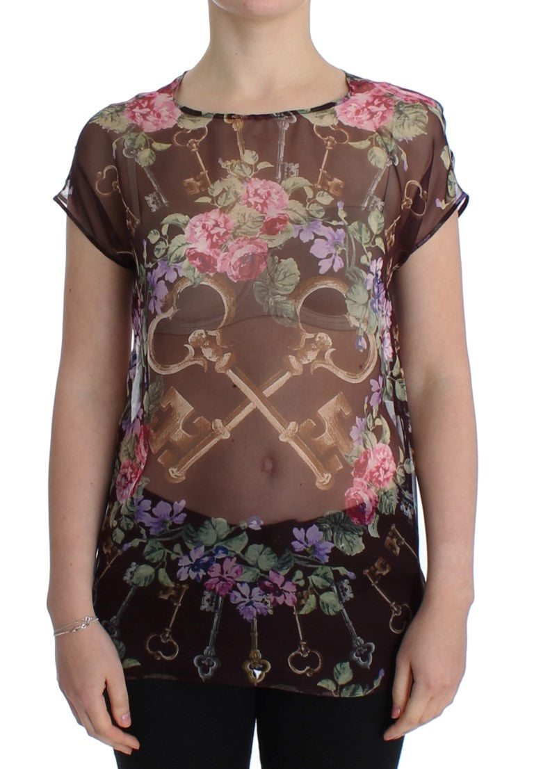 Dolce & Gabbana – Elegante Seidenbluse mit Blumenmuster und Flügelärmeln