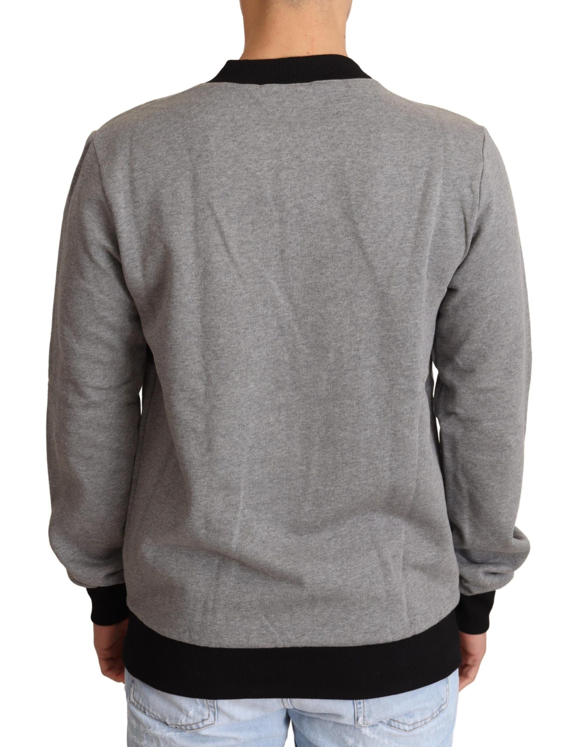 Dolce &amp; Gabbana – Eleganter grauer Pullover mit Rundhalsausschnitt und Kronenmotiv