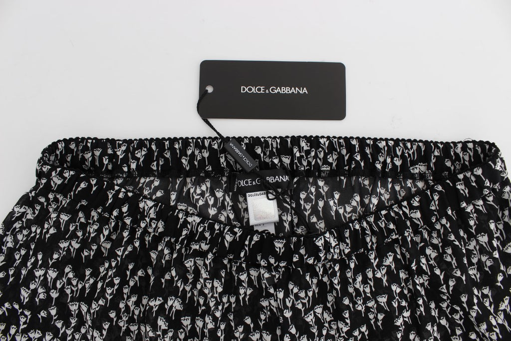Dolce &amp; Gabbana Elegante schwarz-weiße Shorts aus Seidenspitze mit Blumenmuster