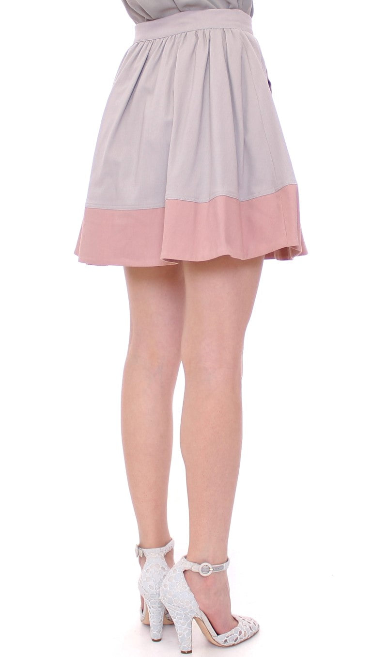 Comeforbreakfast – Eleganter, plissierter Minirock in Pink und Grau