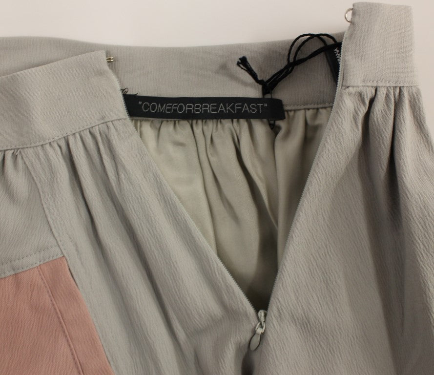 Comeforbreakfast – Eleganter, plissierter Minirock in Pink und Grau