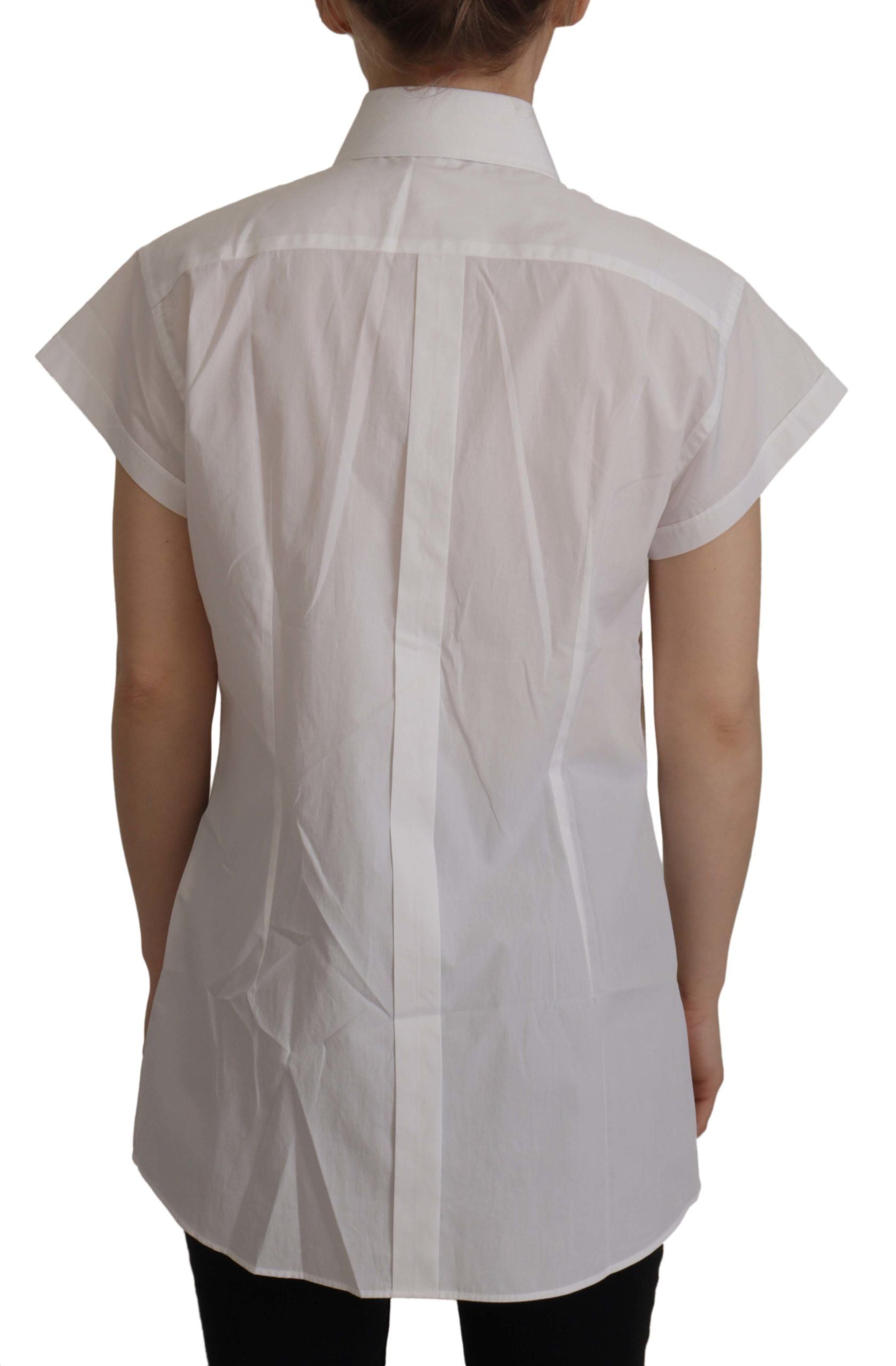Dolce &amp; Gabbana Elegante ärmellose Smokingbluse mit Kristallknöpfen