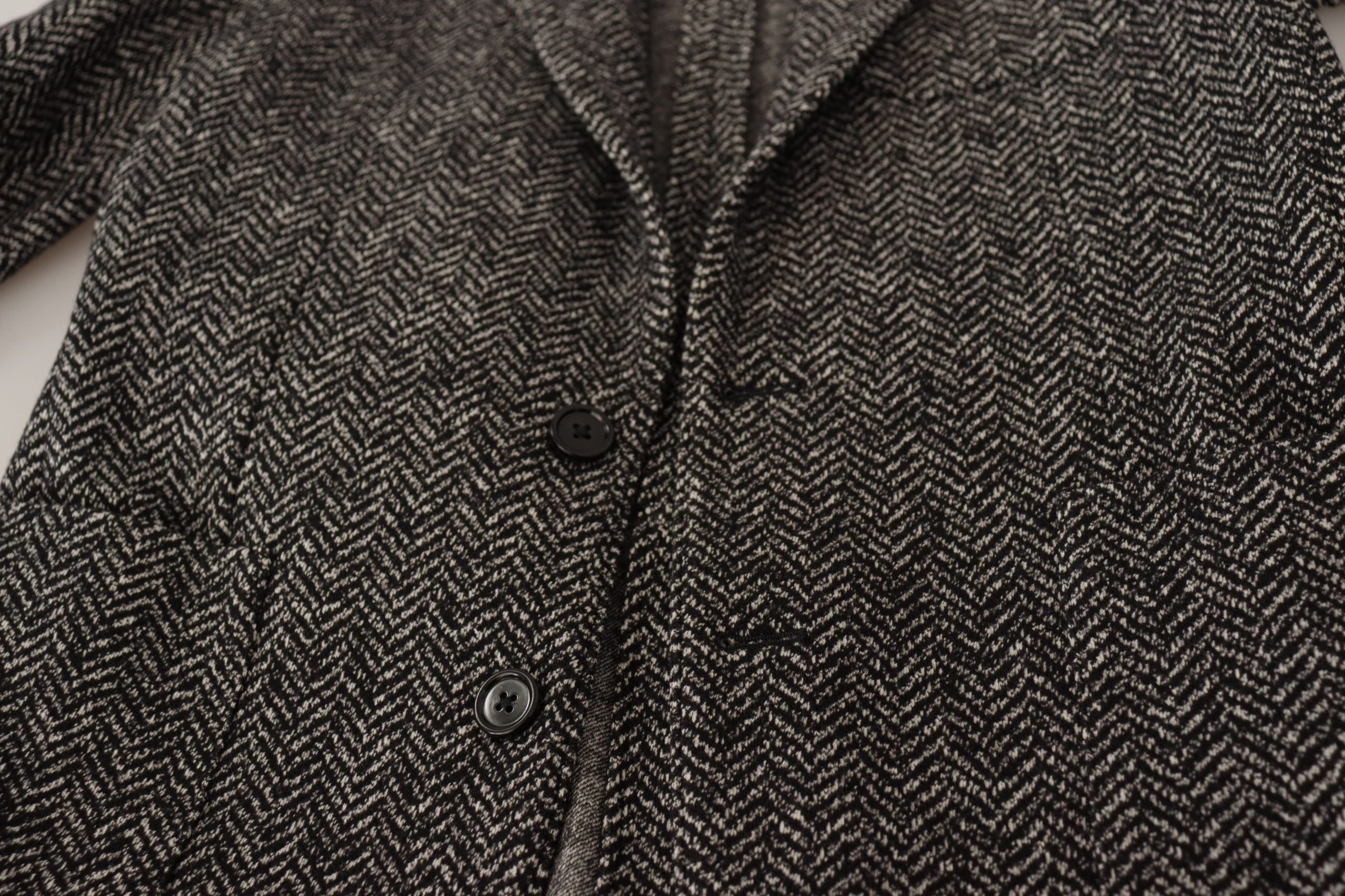 Dolce &amp; Gabbana – Exquisite Blazerjacke in Grau mit Fischgrätenmuster