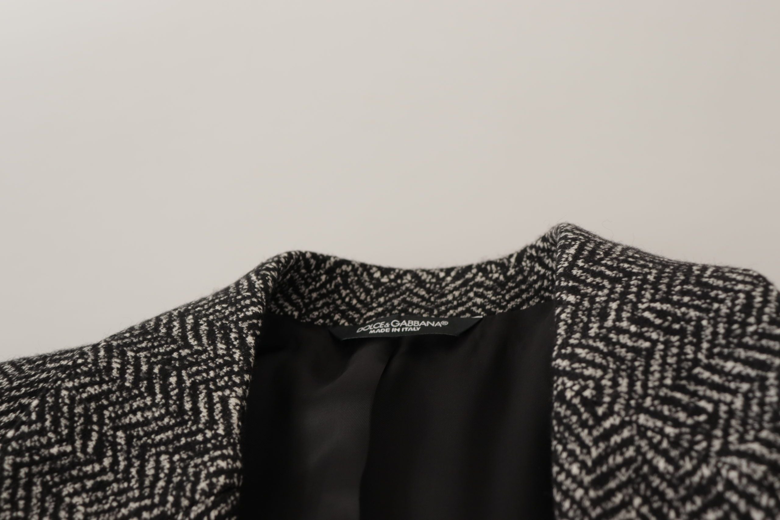 Dolce &amp; Gabbana – Exquisite Blazerjacke in Grau mit Fischgrätenmuster
