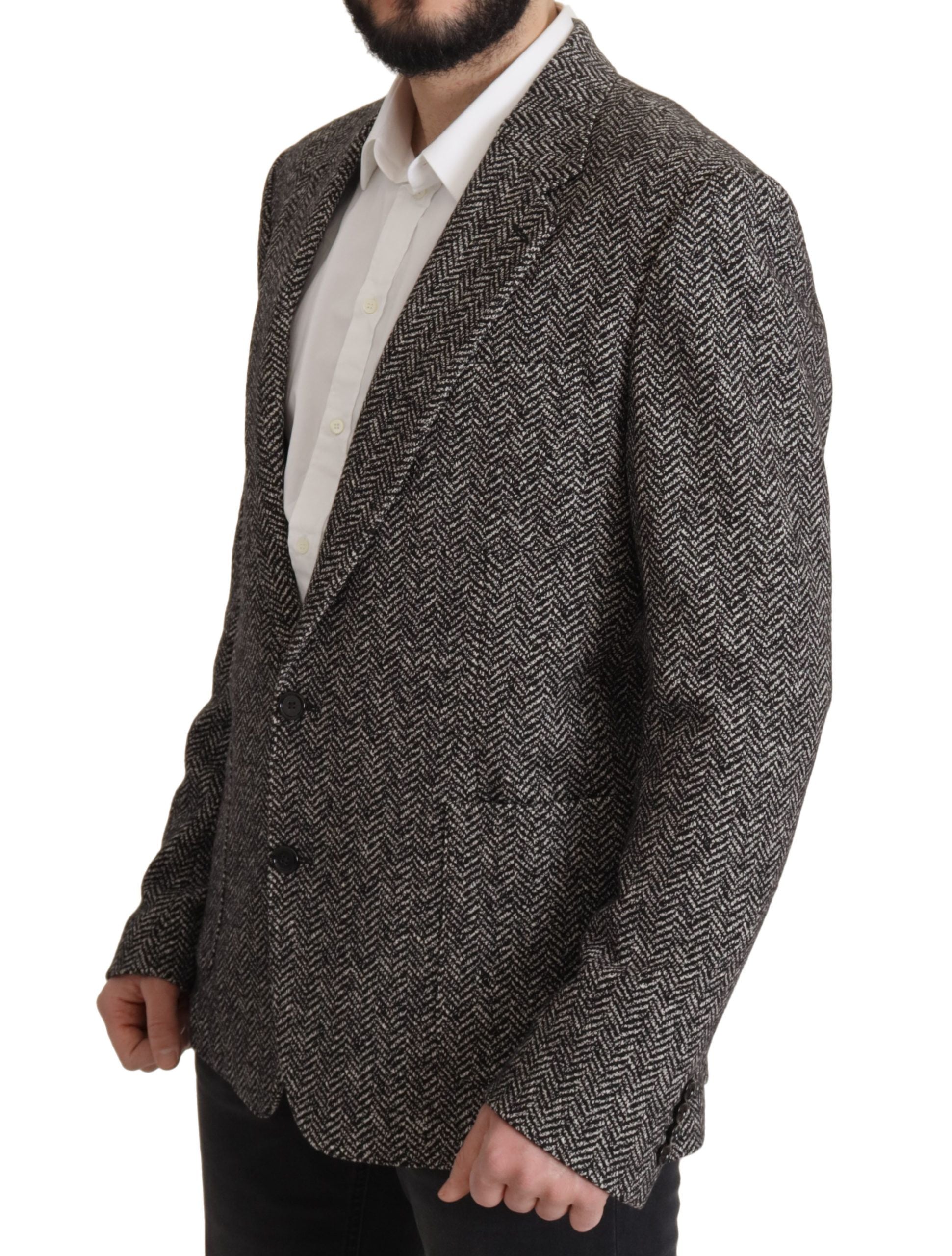 Dolce &amp; Gabbana – Exquisite Blazerjacke in Grau mit Fischgrätenmuster
