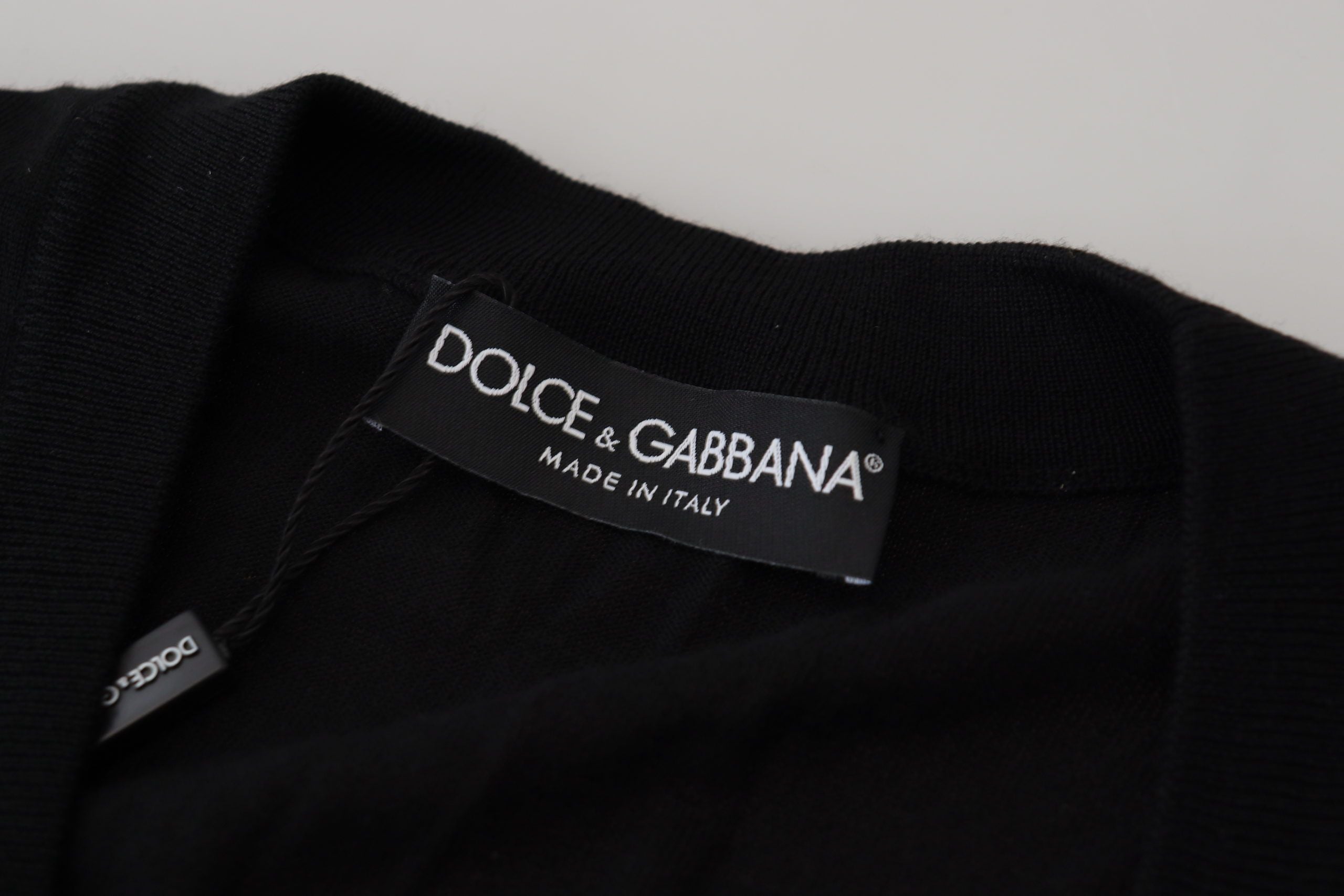 Dolce &amp; Gabbana Elegante schwarze Strickjacke aus Wolle mit Knöpfen