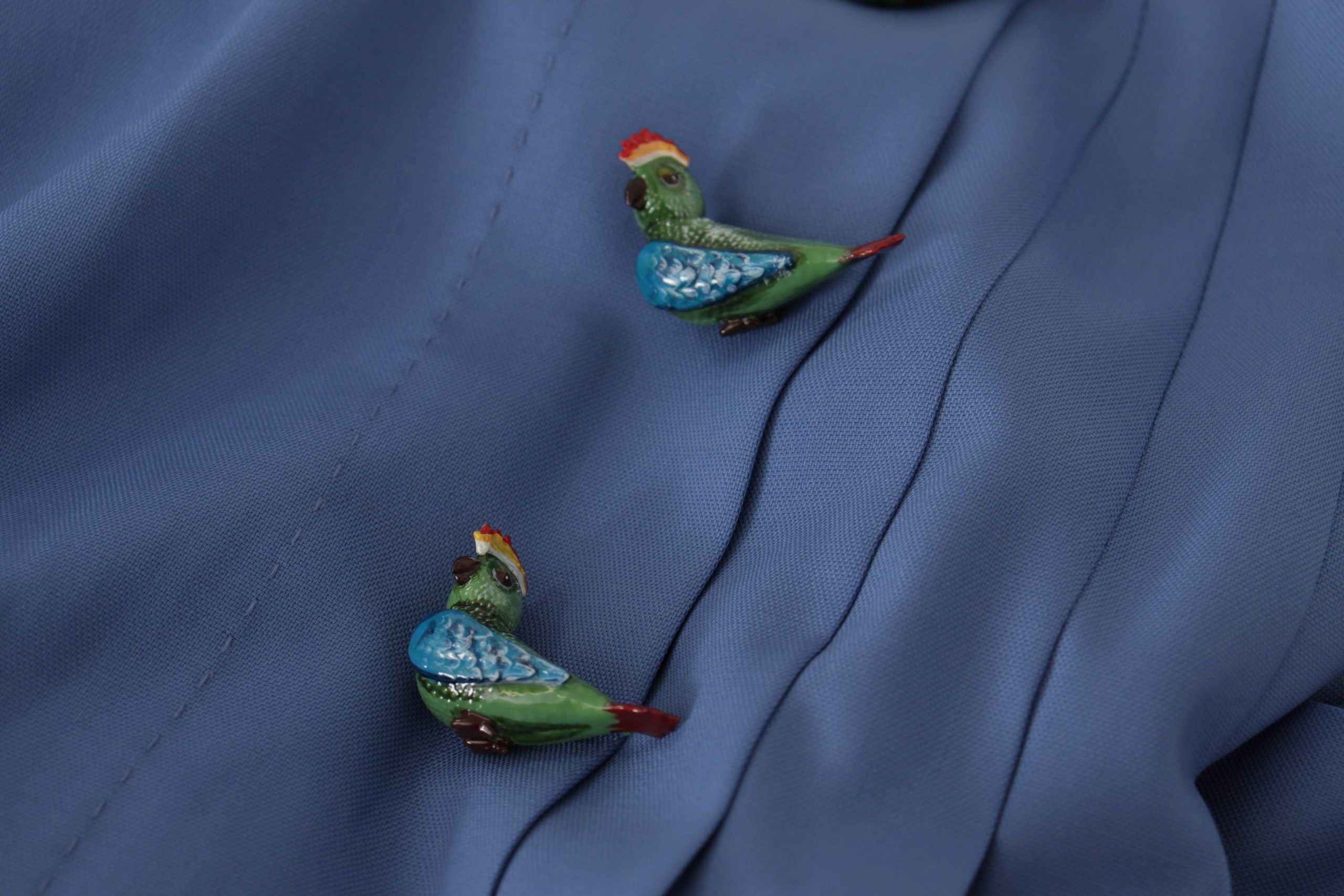Dolce &amp; Gabbana Eleganter plissierter A-Linien-Minirock mit Vogelapplikationen