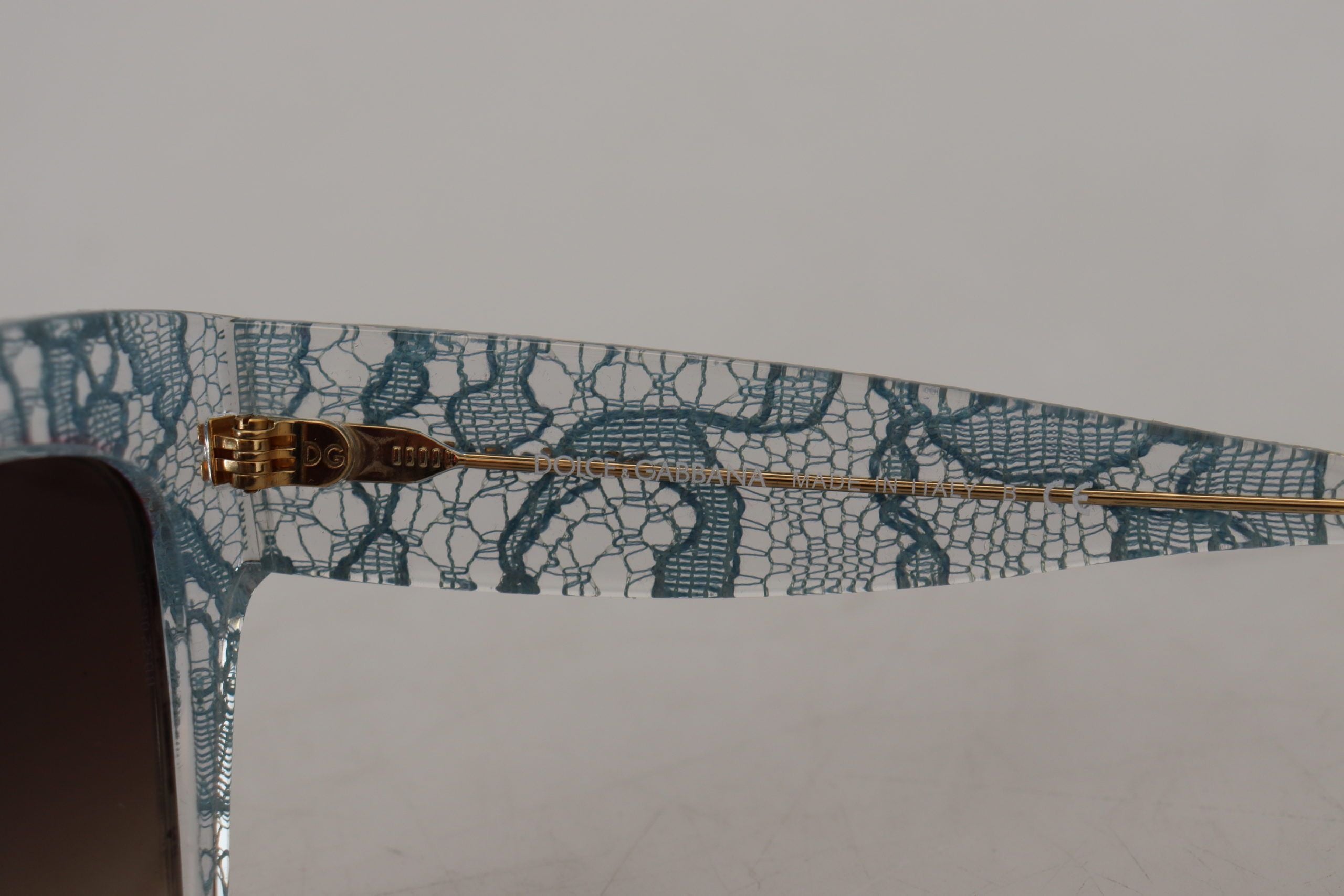 Dolce &amp; Gabbana Elegante blaue Sonnenbrille mit Spitzendetail
