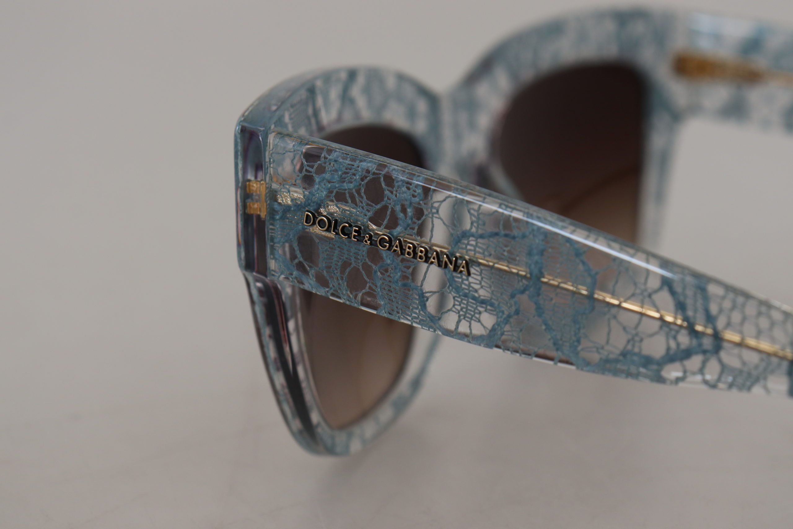 Dolce &amp; Gabbana Elegante blaue Sonnenbrille mit Spitzendetail
