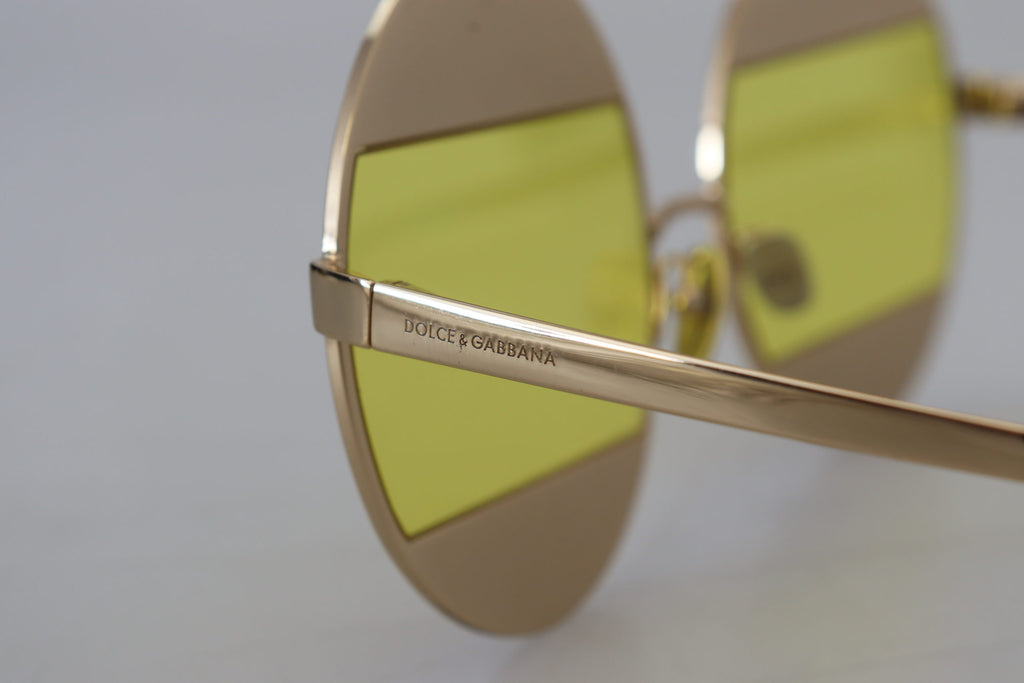 Dolce &amp; Gabbana – Ovale Sonnenbrille in Gold mit Kristallverzierung