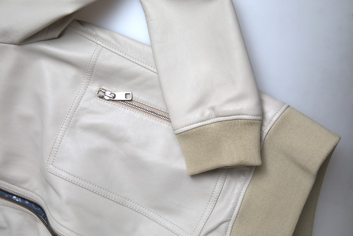 Dolce &amp; Gabbana – Cremefarbene Bomber-Blousonjacke aus Leder mit durchgehendem Reißverschluss