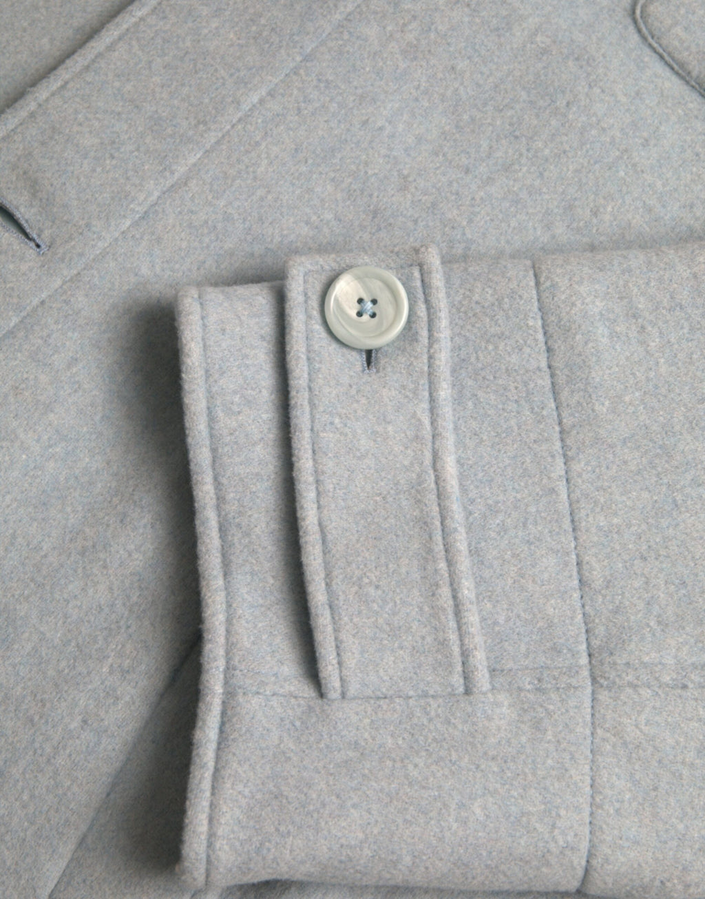 Dolce &amp; Gabbana – Hellblaue Trenchcoat-Jacke aus Wolle mit Knöpfen