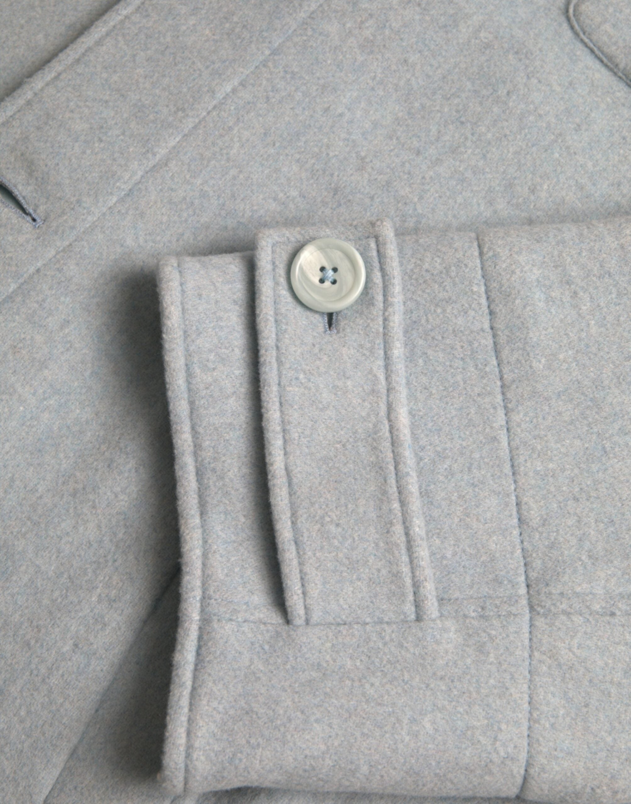 Dolce &amp; Gabbana – Hellblaue Trenchcoat-Jacke aus Wolle mit Knöpfen