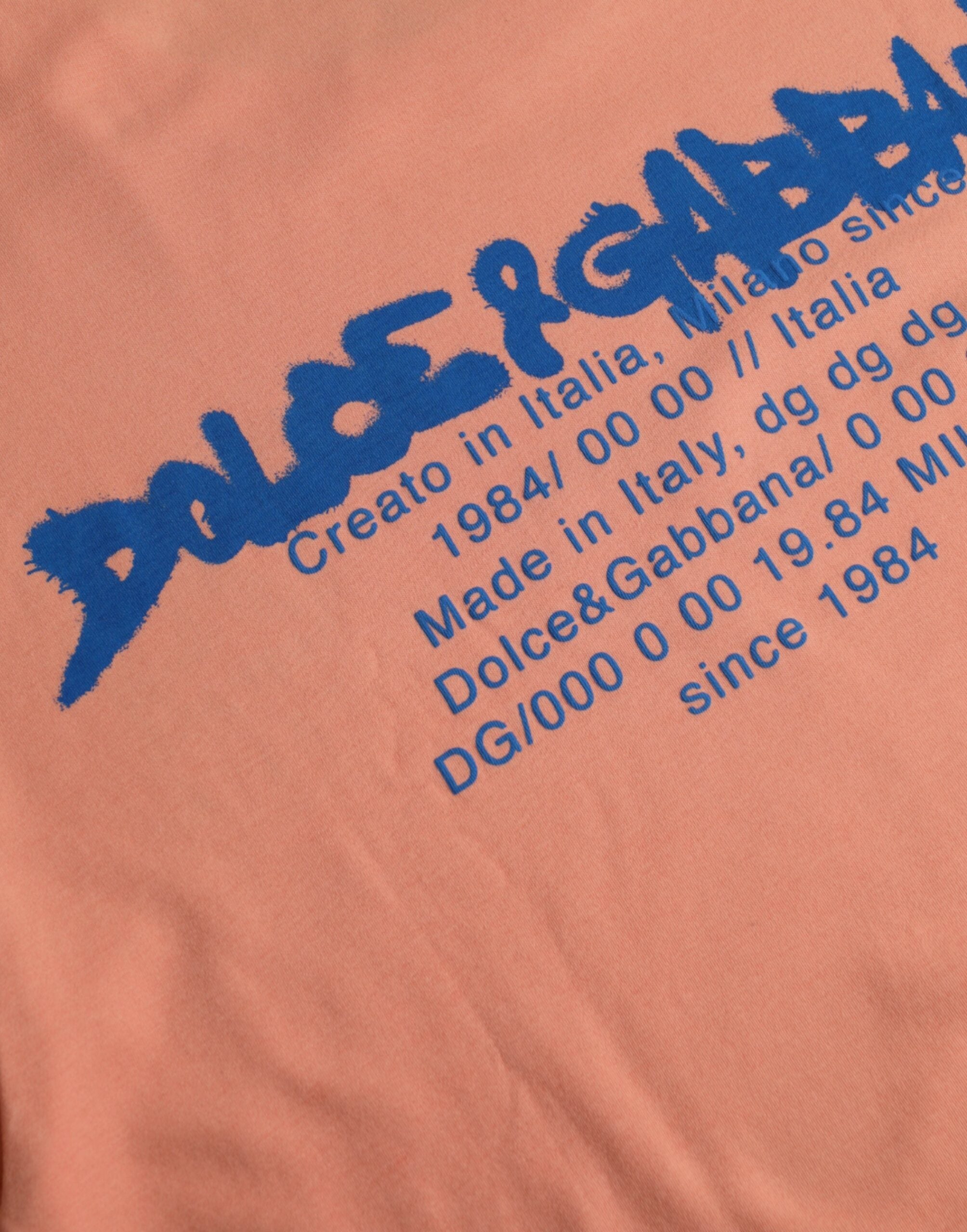 Dolce &amp; Gabbana – Korallenfarbenes, kurzärmliges T-Shirt aus Baumwolle mit Logo-Print