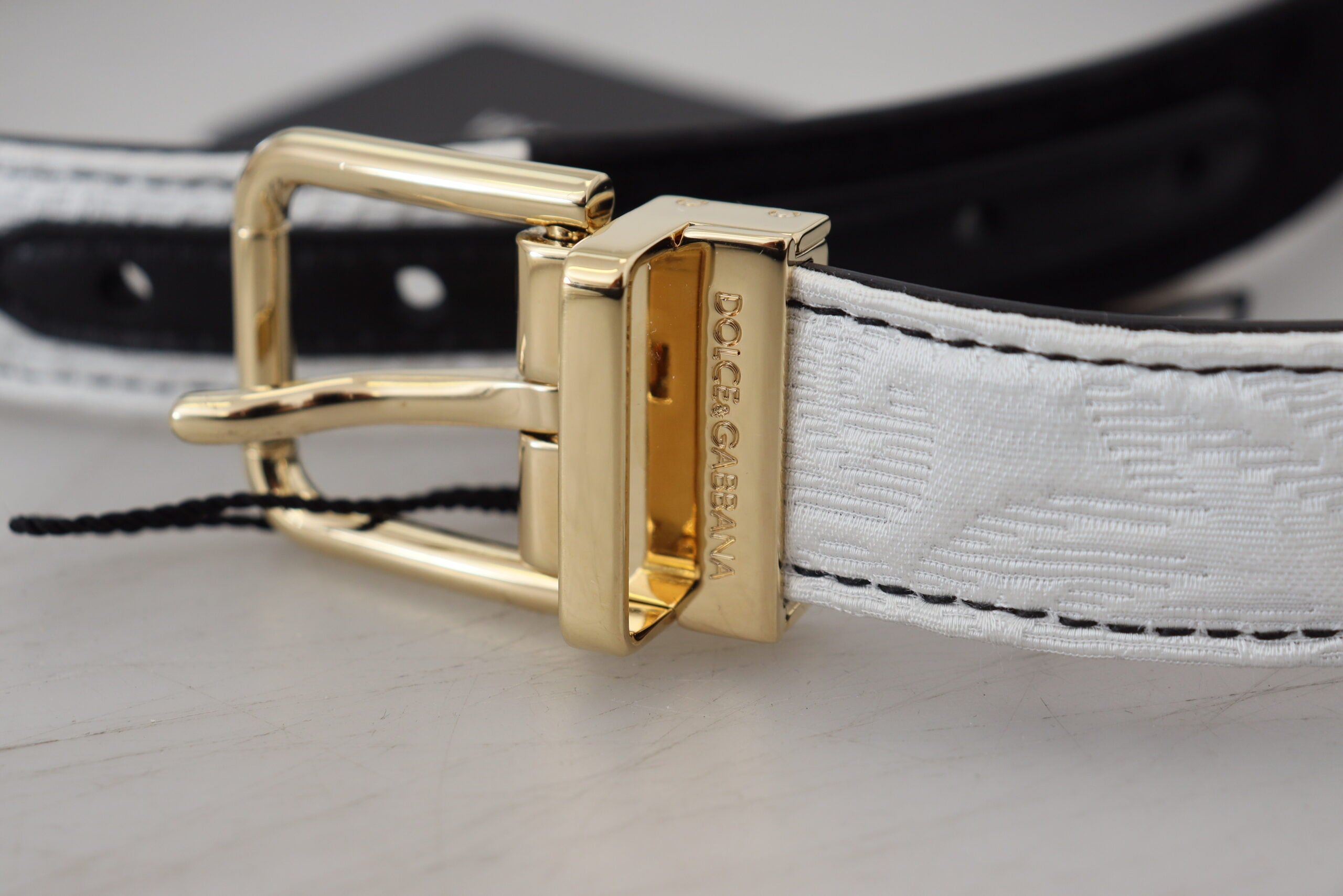 Dolce &amp; Gabbana Weiß-Schwarzer Patchwork-Gürtel mit goldener Metallschnalle