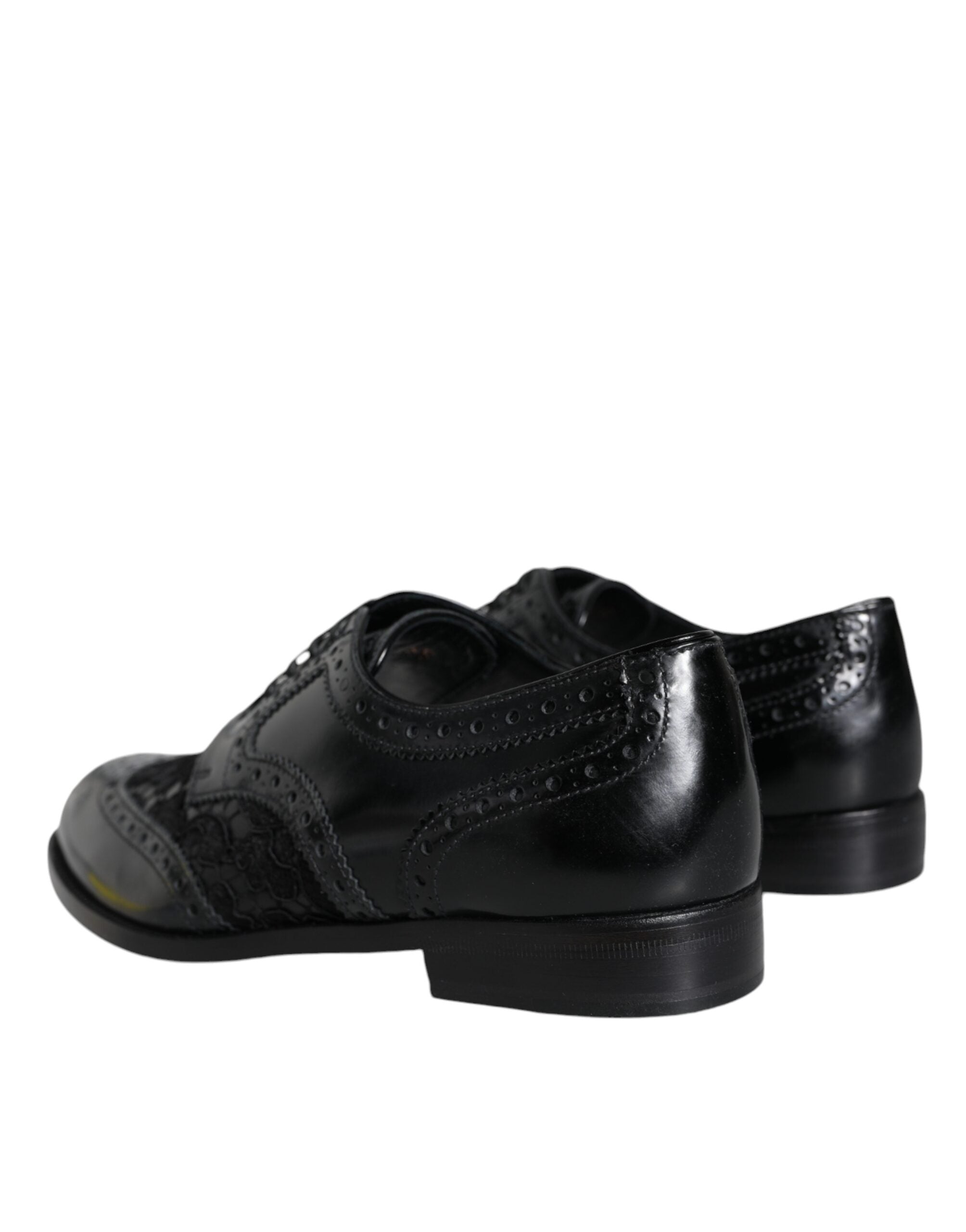 Dolce &amp; Gabbana – Formelle Schuhe aus schwarzem Leder mit floraler Spitze