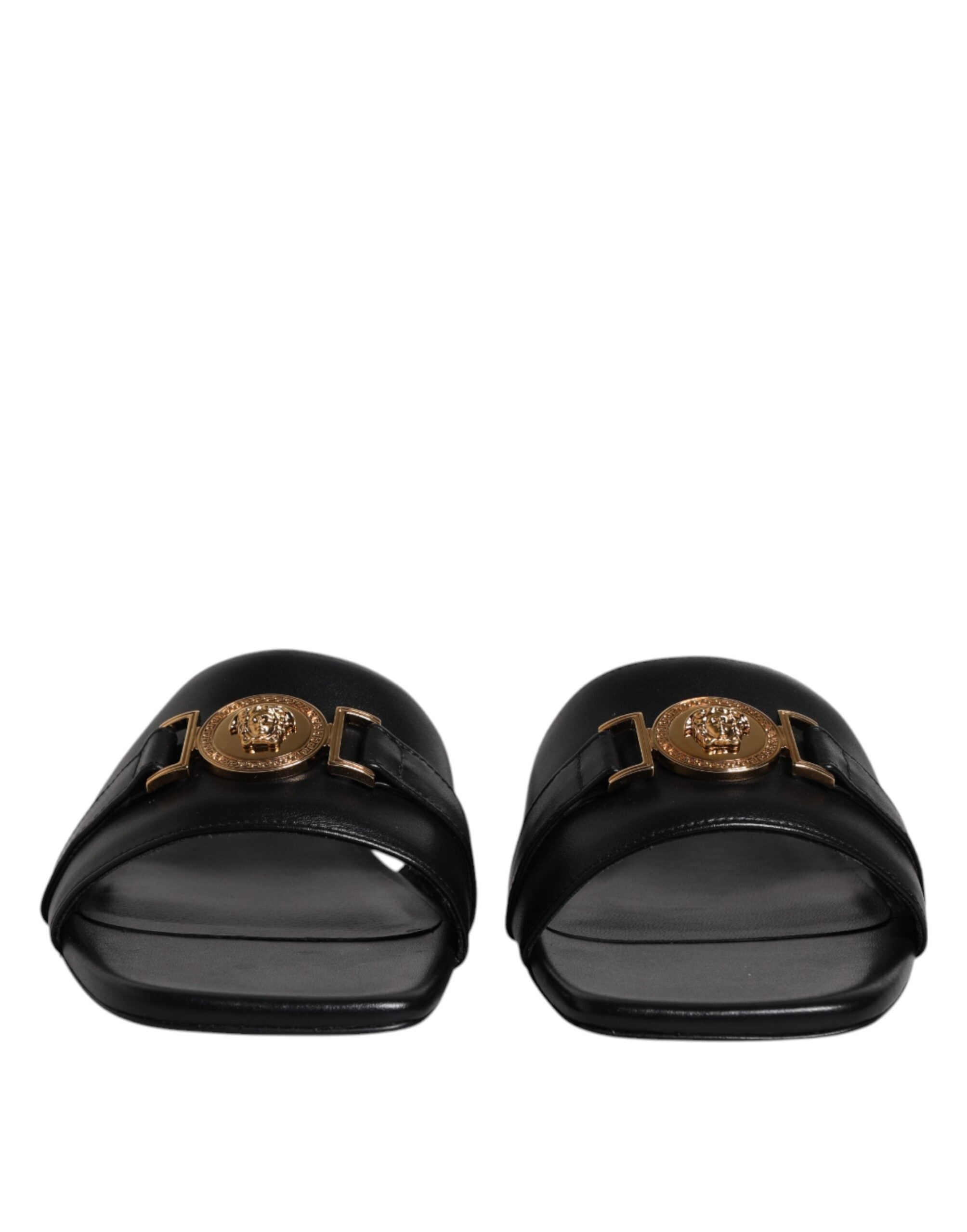 Versace – Schwarze Slipper aus Leder mit Logo-Schild