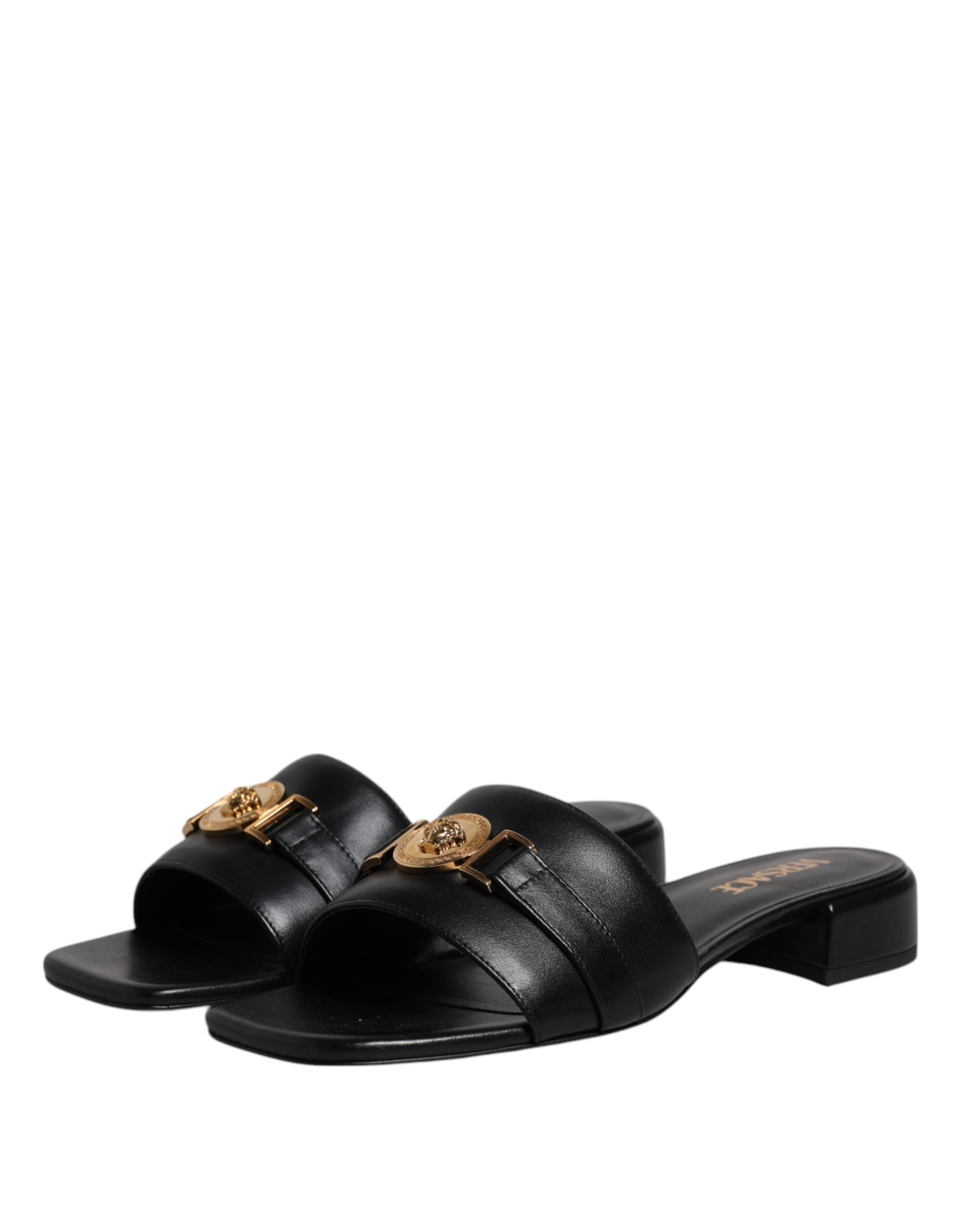 Versace – Schwarze Slipper aus Leder mit Logo-Schild