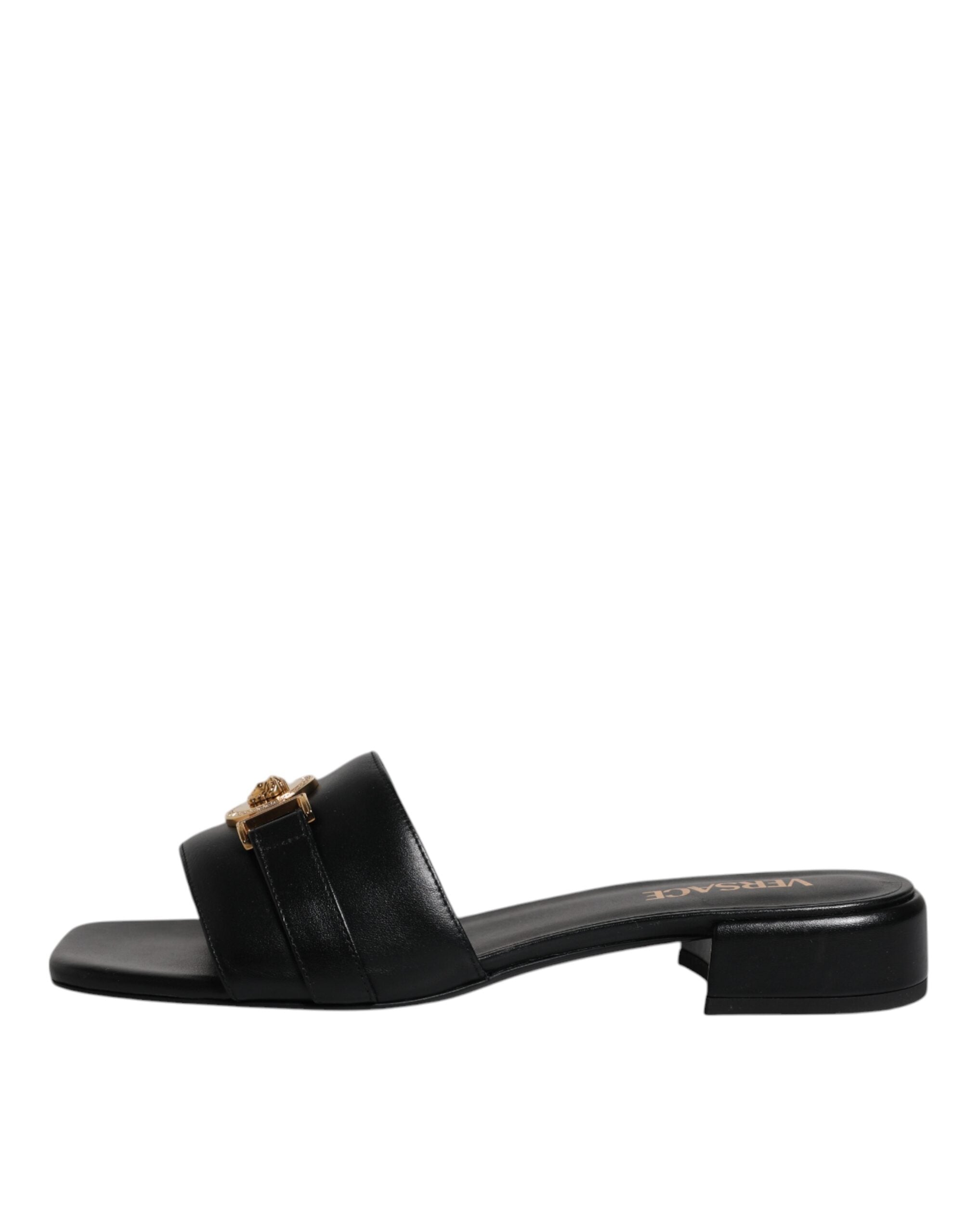 Versace – Schwarze Slipper aus Leder mit Logo-Schild