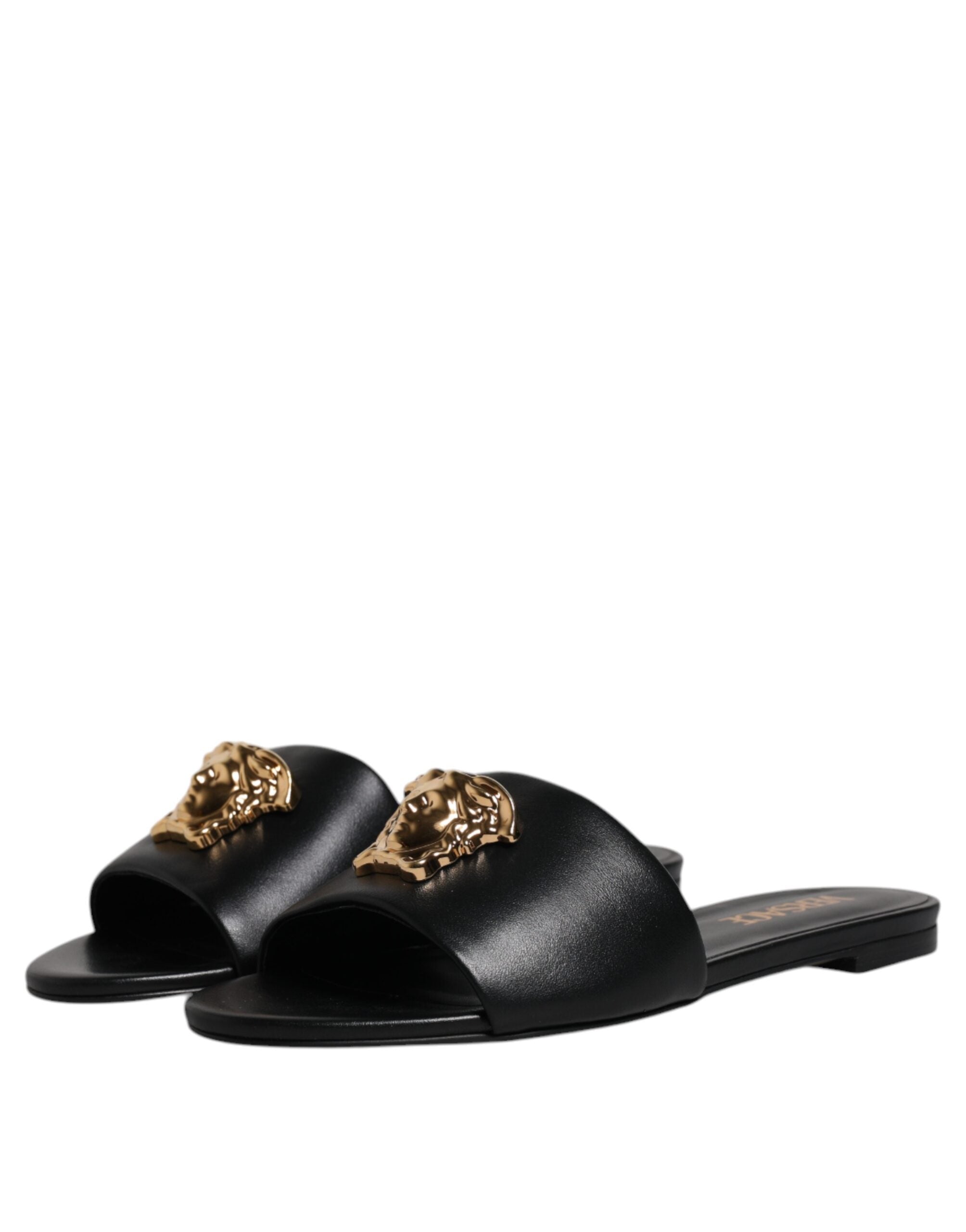 Versace – Schwarze Slipper aus Leder mit Logo-Schild