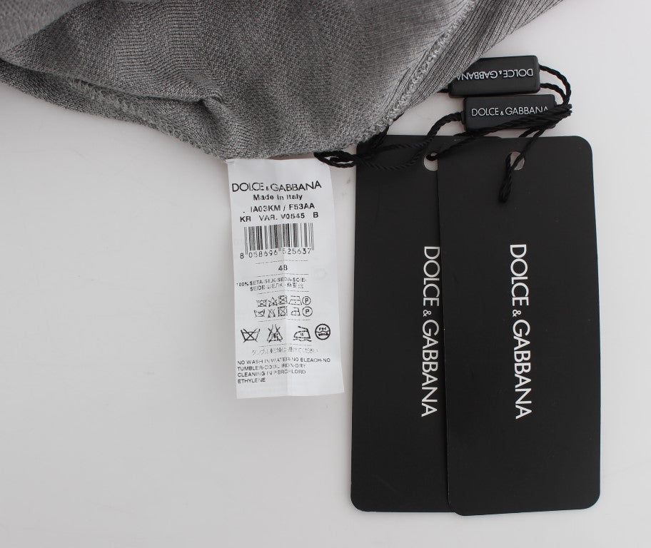 Dolce &amp; Gabbana Eleganter grauer Pullover mit Rundhalsausschnitt aus Seide