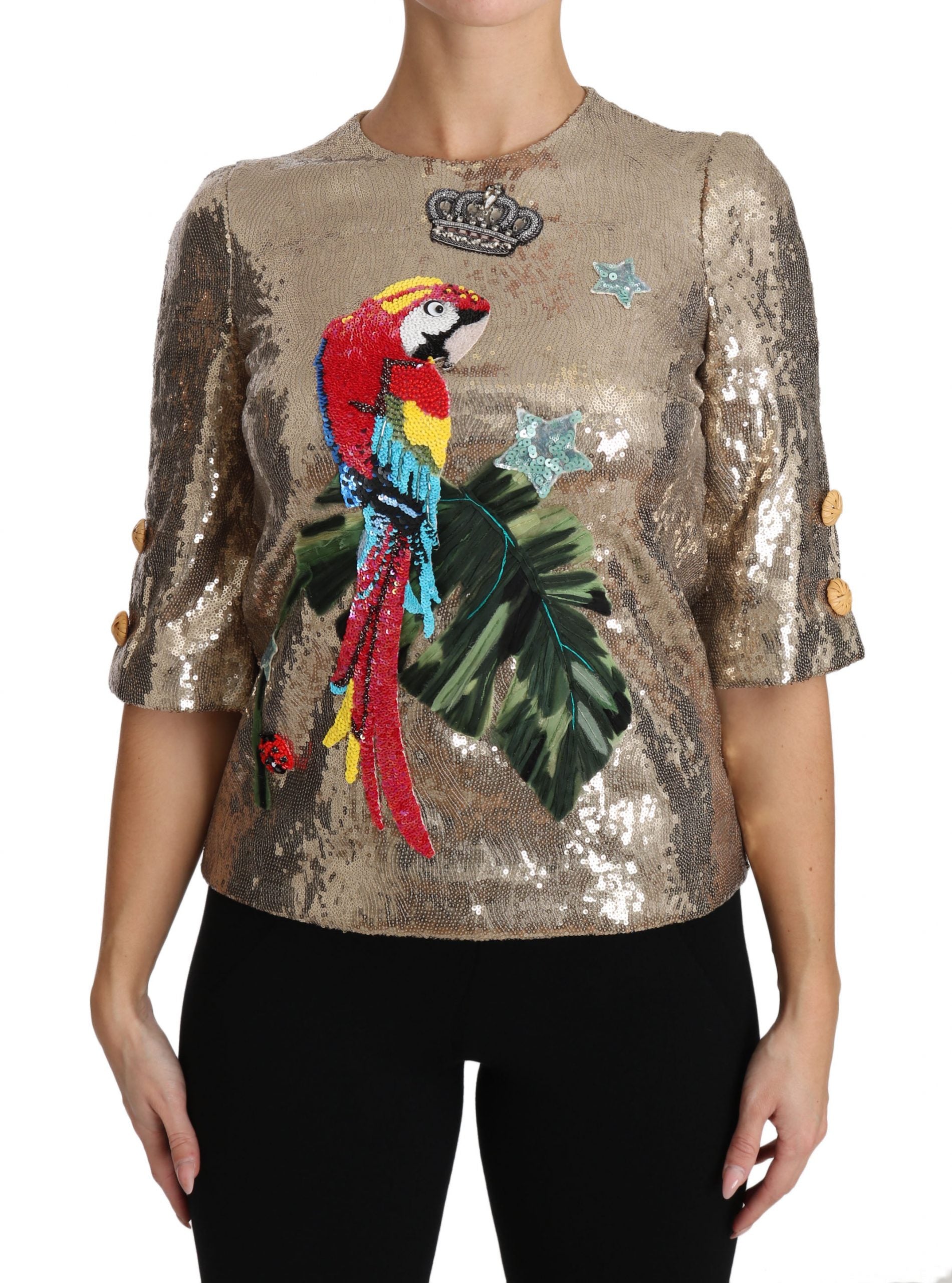 Dolce &amp; Gabbana – Rundhalsbluse mit goldenem Papageienmotiv und Kristallen