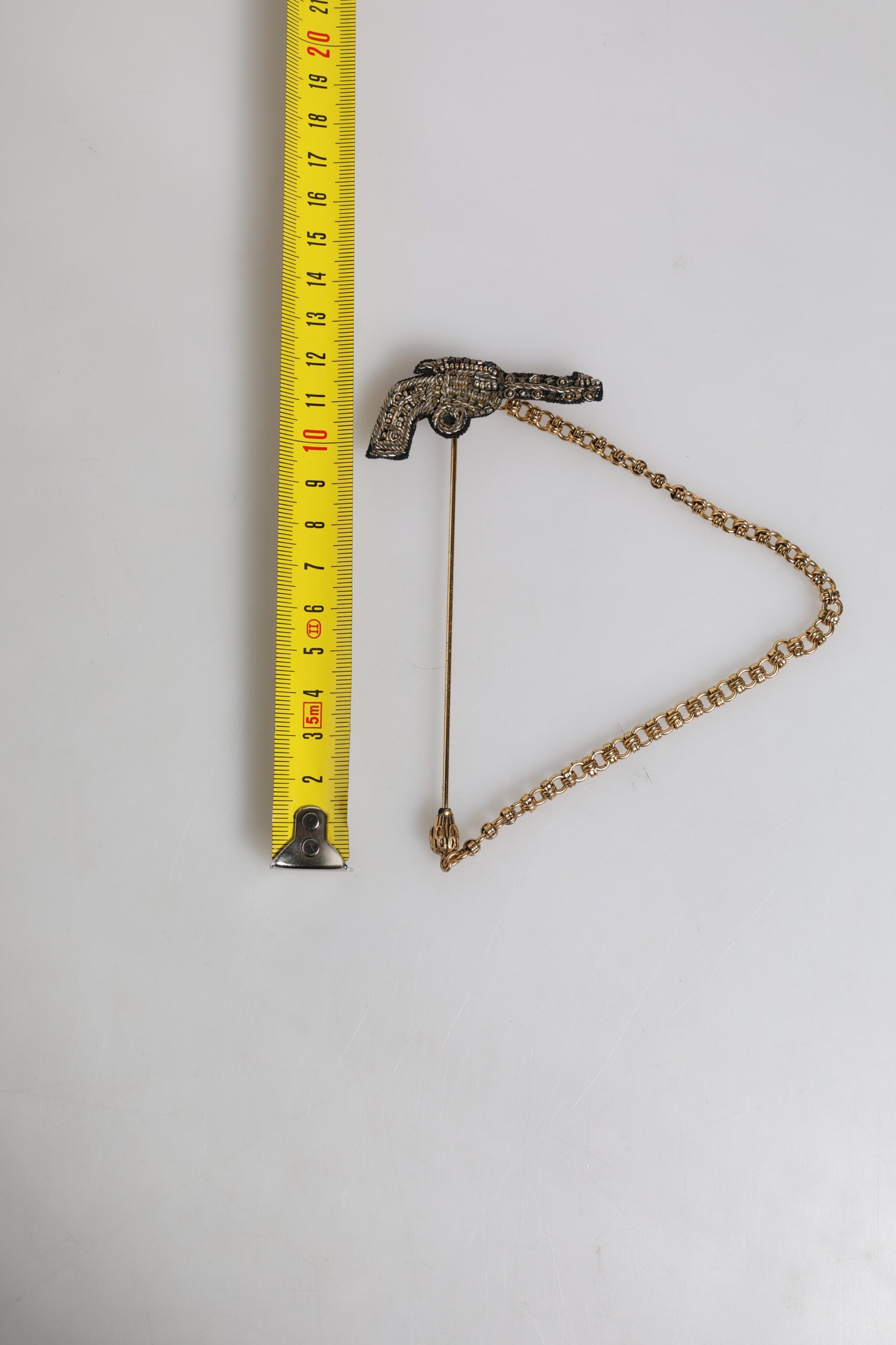 Dolce &amp; Gabbana Revolverbrosche, Anstecknadel, Schwarzgold, Messing, Kupfer