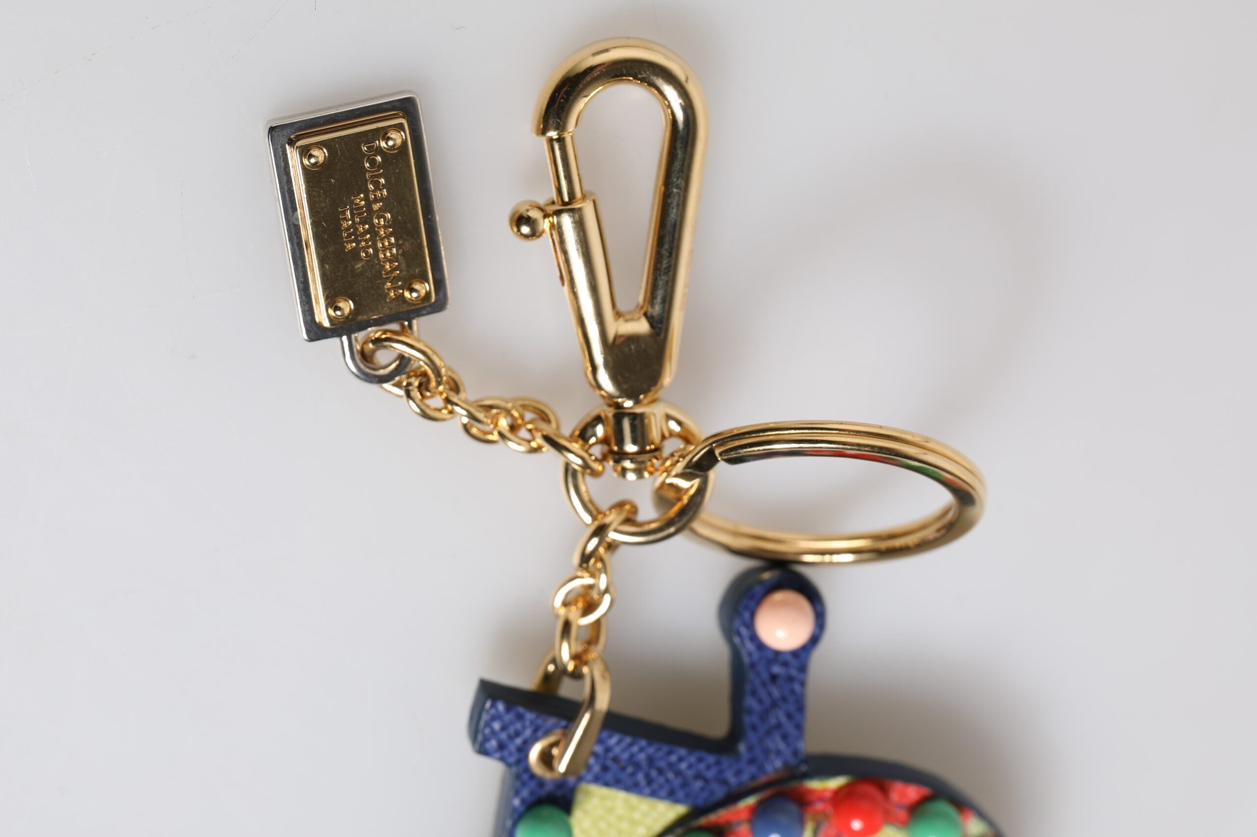 Dolce &amp; Gabbana Mehrfarbiger goldfarbener Carretto-Schlüsselanhänger