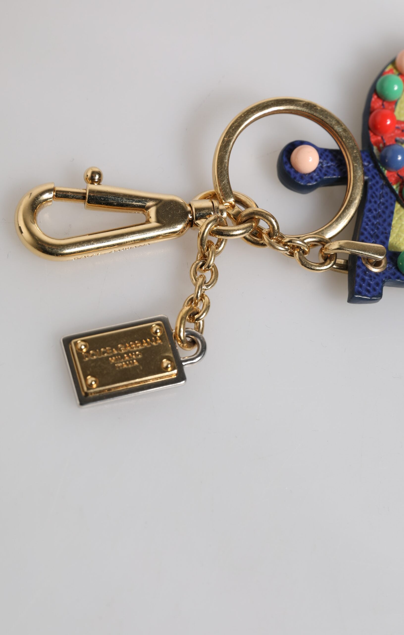 Dolce &amp; Gabbana Mehrfarbiger goldfarbener Carretto-Schlüsselanhänger