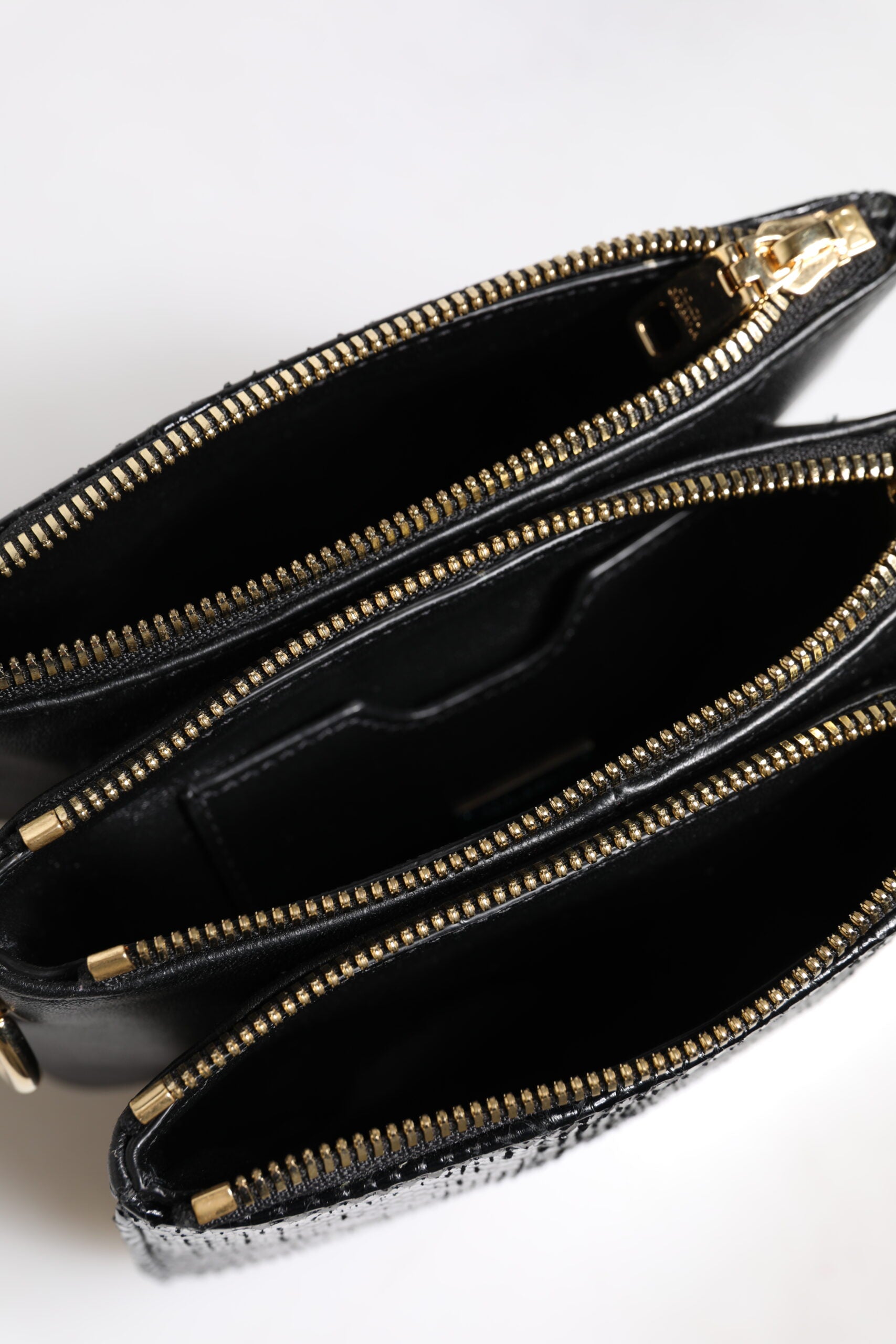 Dolce &amp; Gabbana – Schwarze Clutch aus exotischem Leder