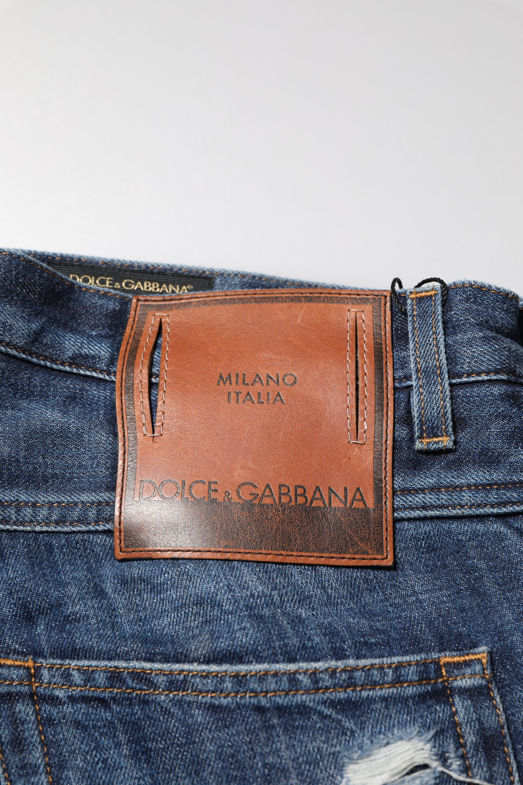 Dolce &amp; Gabbana Blaue zerfetzte konische Jeans aus Baumwolle für Herren