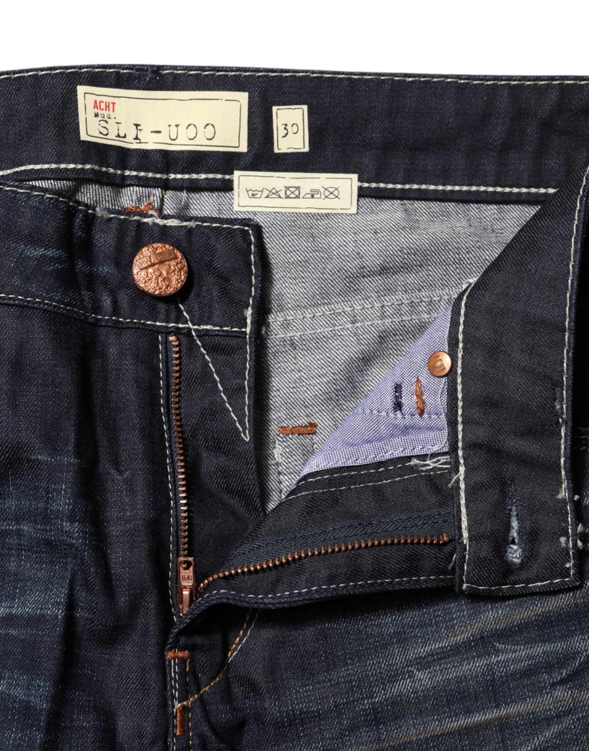 Acht – Blaue, verwaschene Schlagjeans aus Baumwolle mit mittlerer Taille