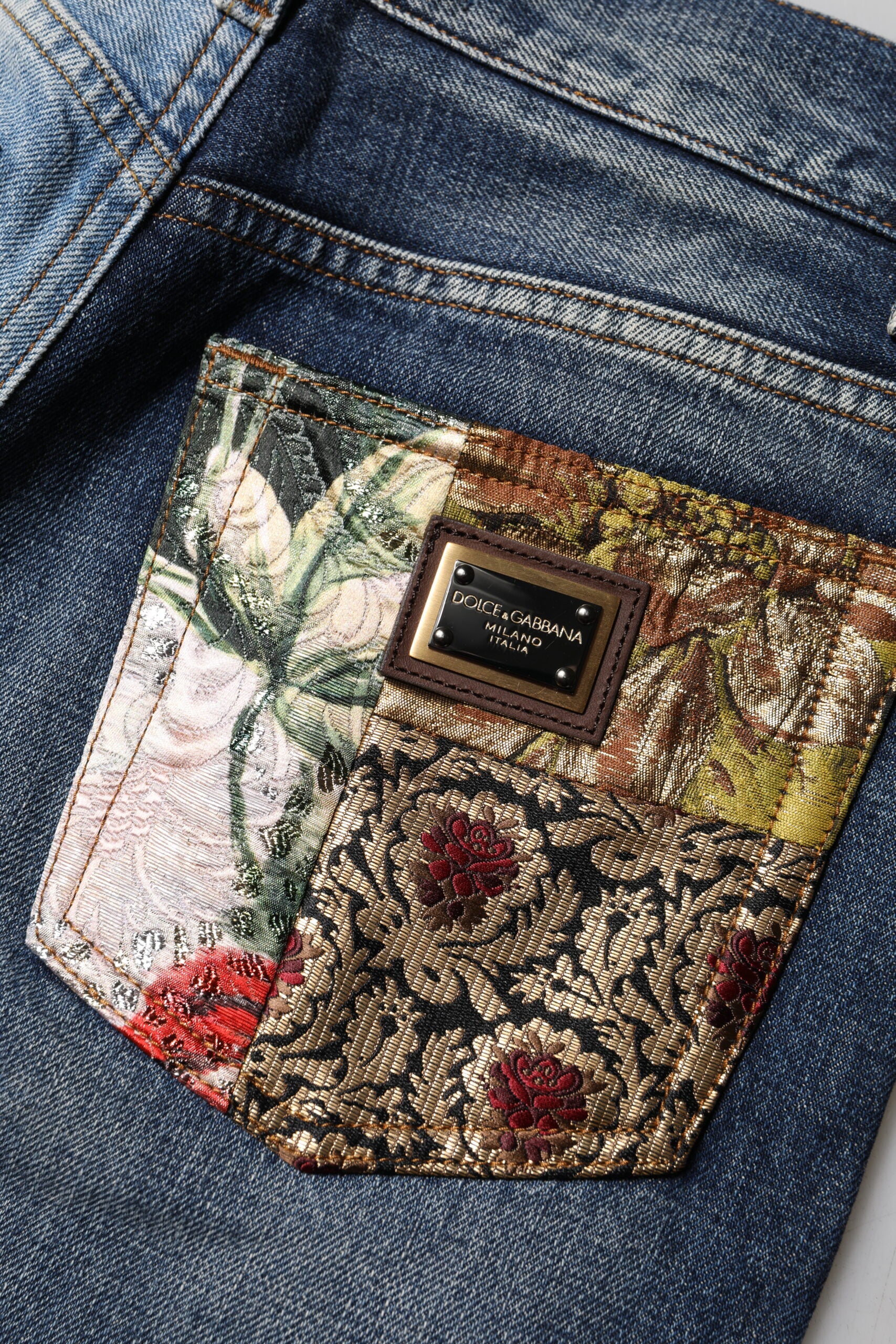 Dolce &amp; Gabbana – Mehrfarbige, konisch zulaufende Patchwork-Jeans aus Denim 