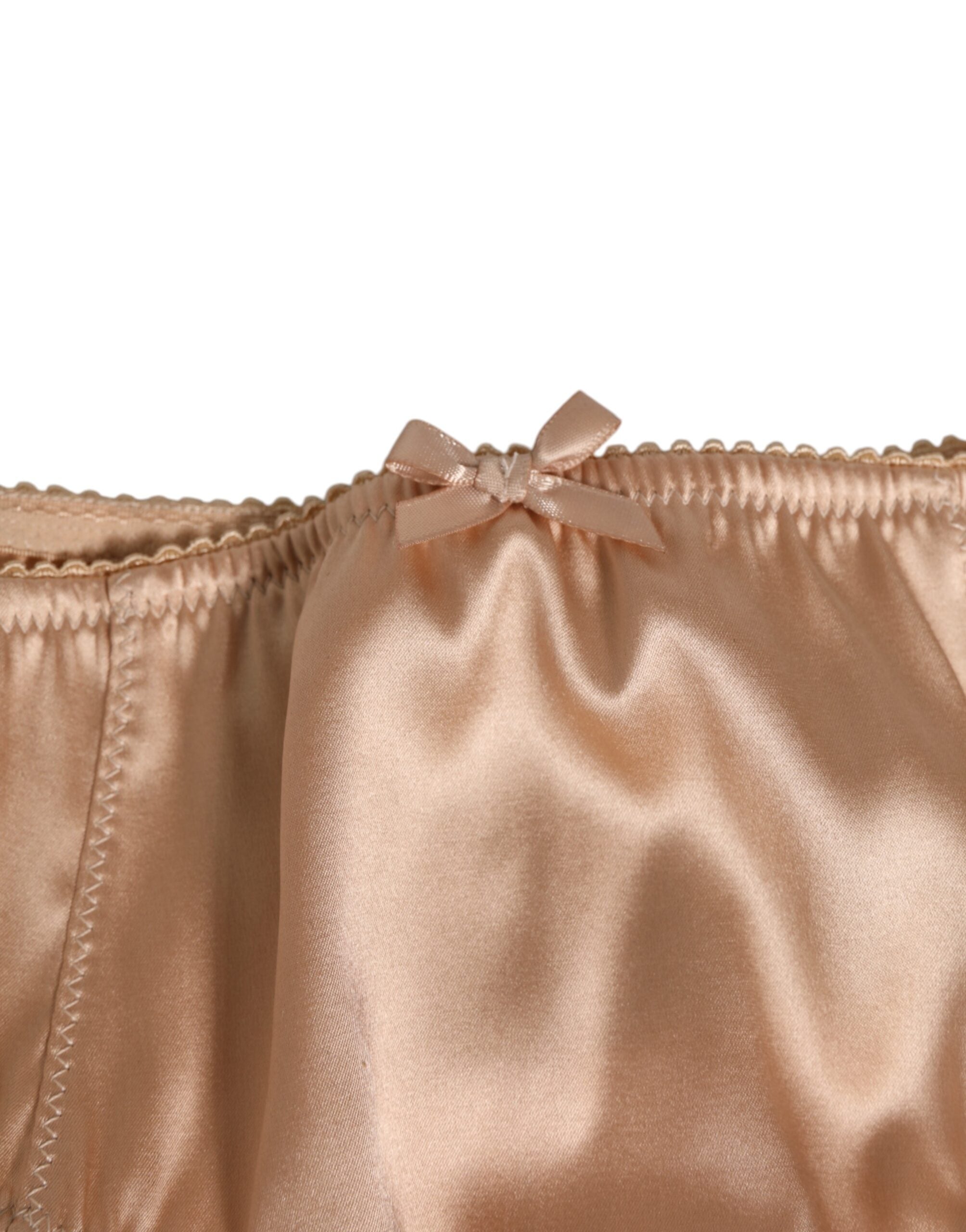 Dolce &amp; Gabbana – Slip aus Seidensatin mit Stretch und Schleife in Nude-Beige