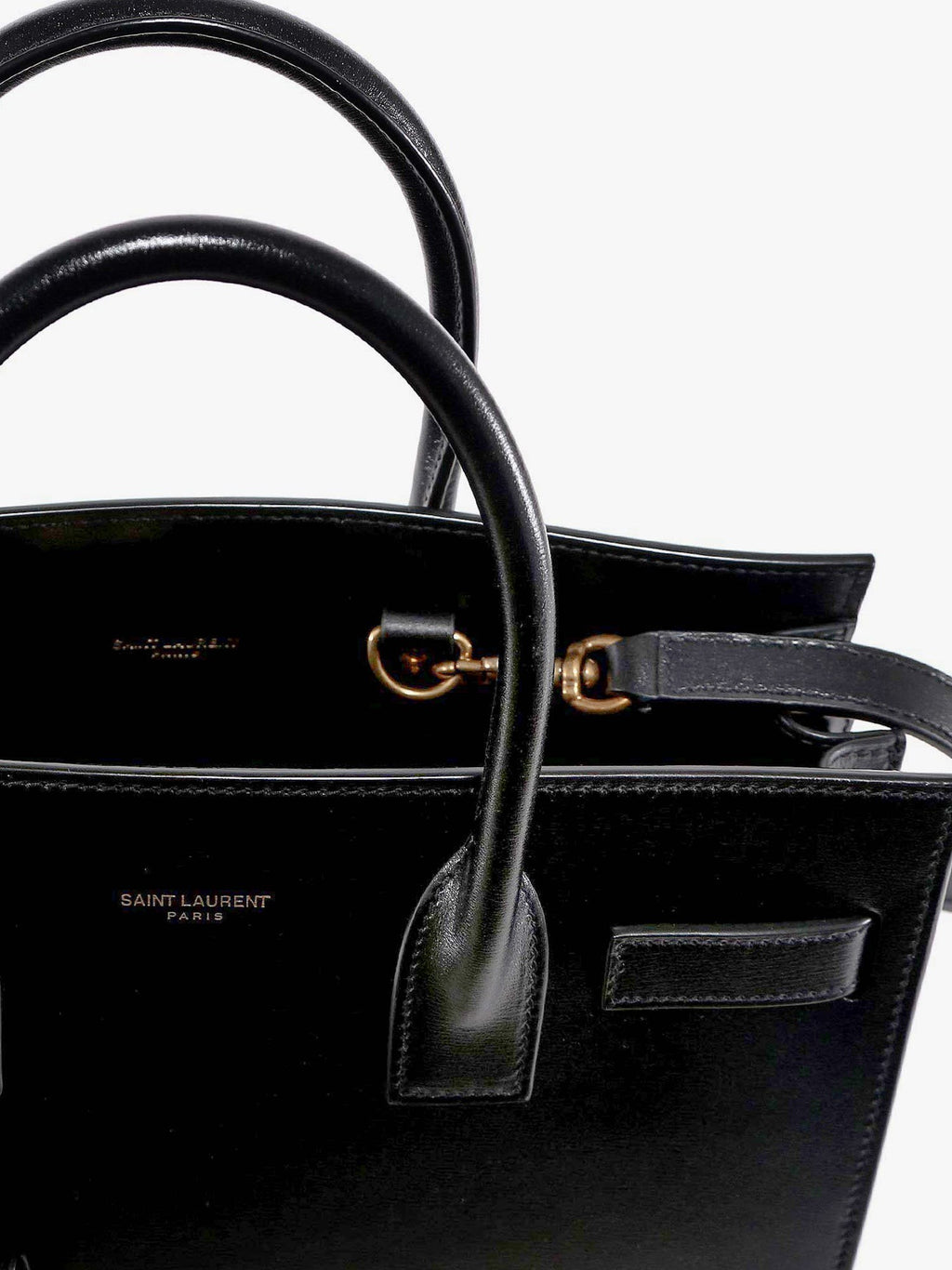Saint Laurent Baby Sac de Jour leather handbag with padlock