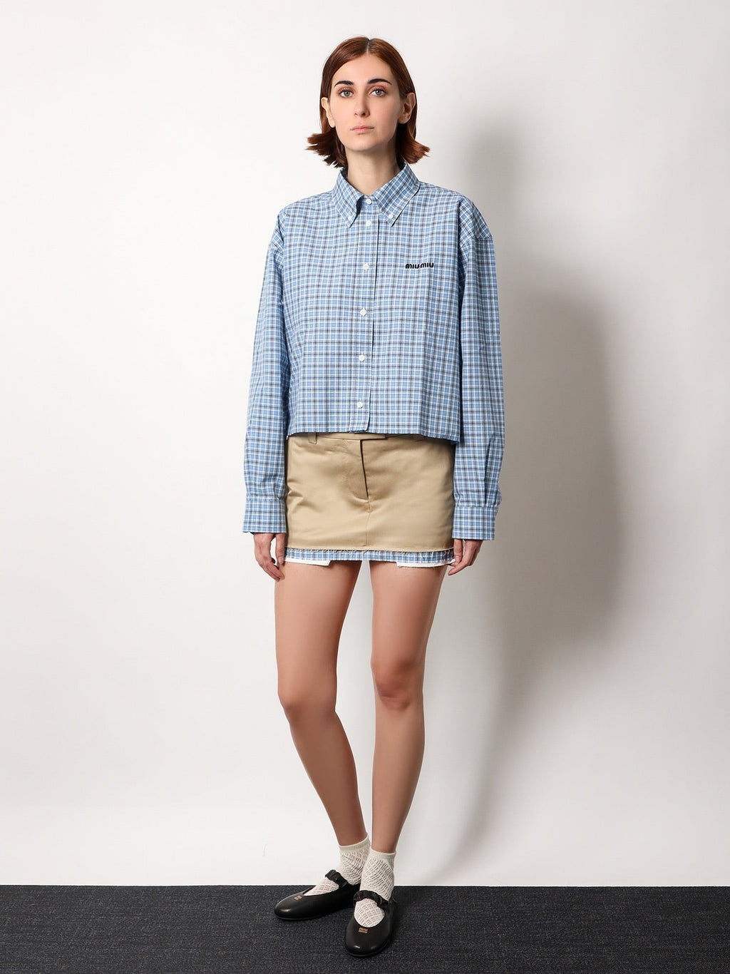 Miu Miu Cotton skirt with check insert on the bottom