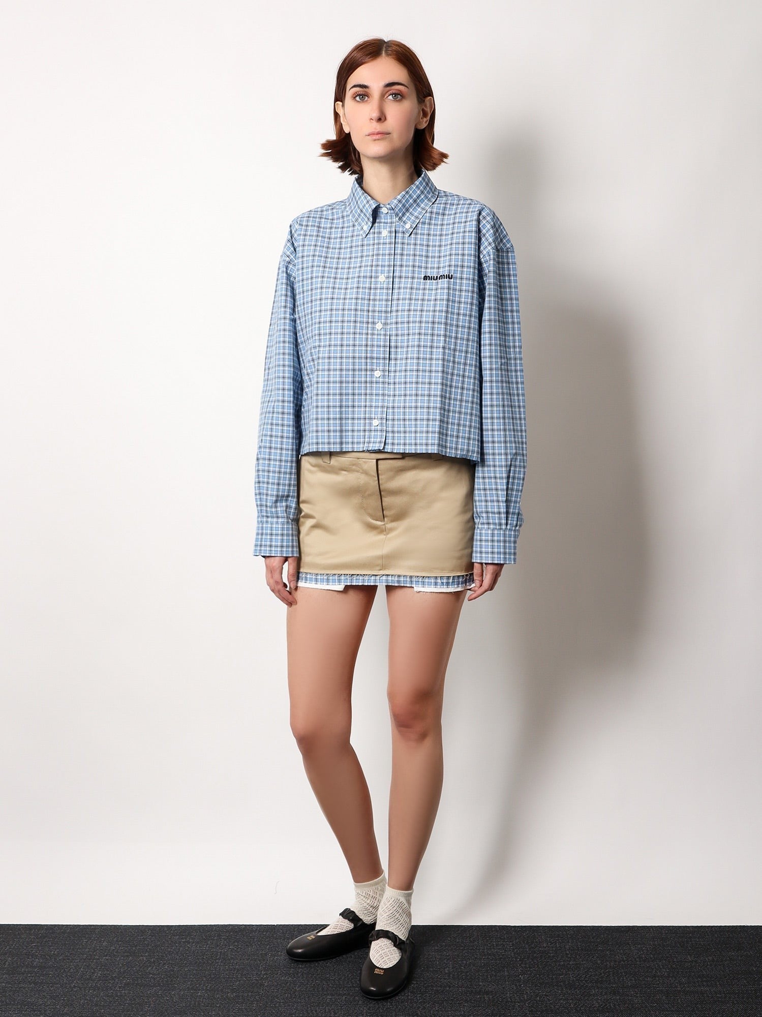 Miu Miu Cotton skirt with check insert on the bottom