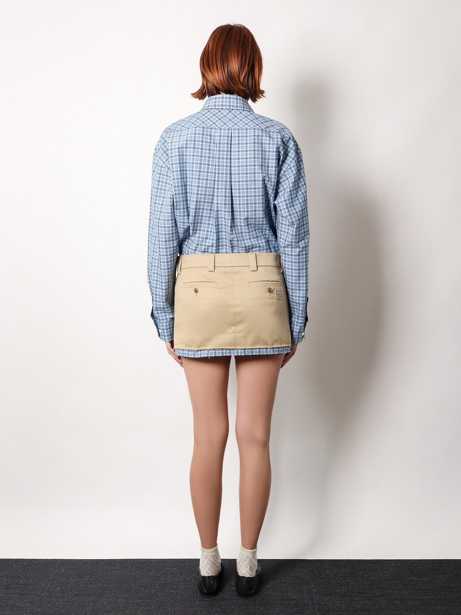Miu Miu Cotton skirt with check insert on the bottom