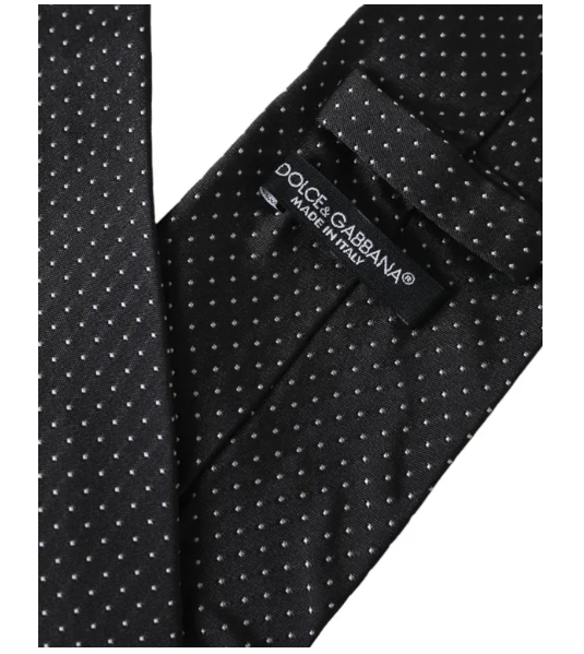 Dolce & Gabbana polka dot tie in black with white dots and brand label made in Italy