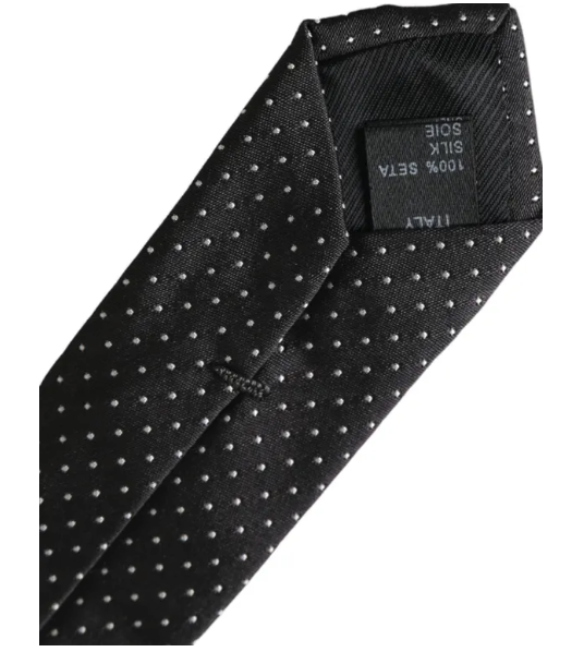 Dolce & Gabbana polka dot tie in black silk with small white dots and classic design