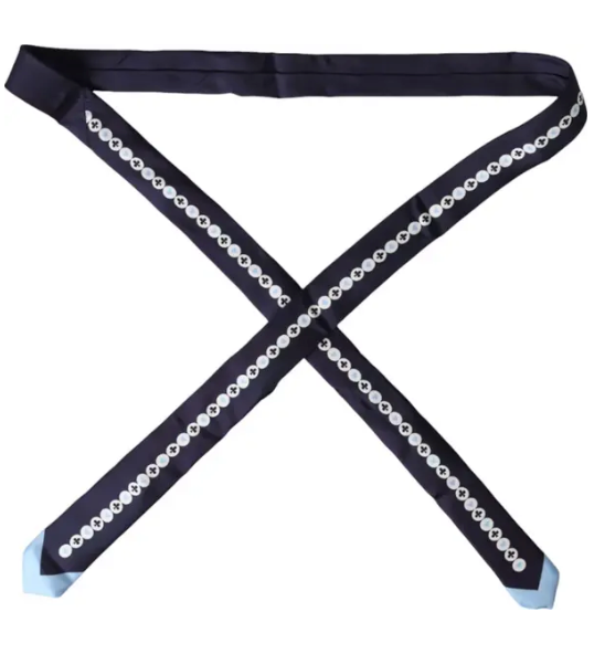 Dolce & Gabbana silk tie in black with white circular button pattern and light blue tips