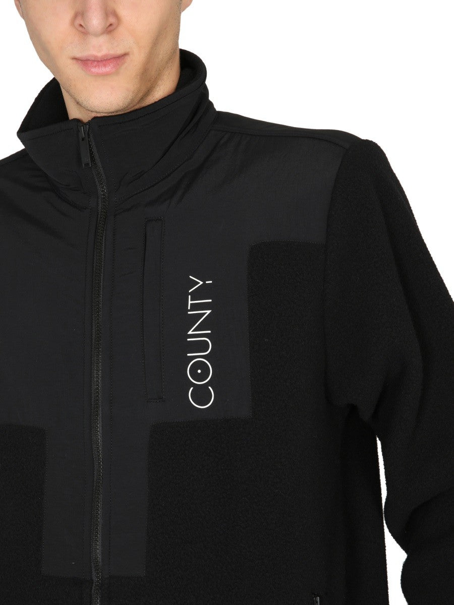 MARCELO BURLON COUNTY OF MILAN GIACCA TRACK CROSS BLOCK