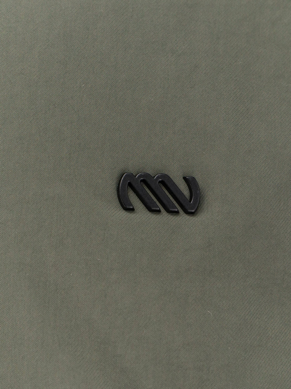 MASSIMO OSTI Nylon jacket with metal logo patch on the front