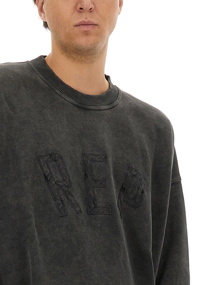 Represent "REP APPLIQUE" SWEATSHIRT