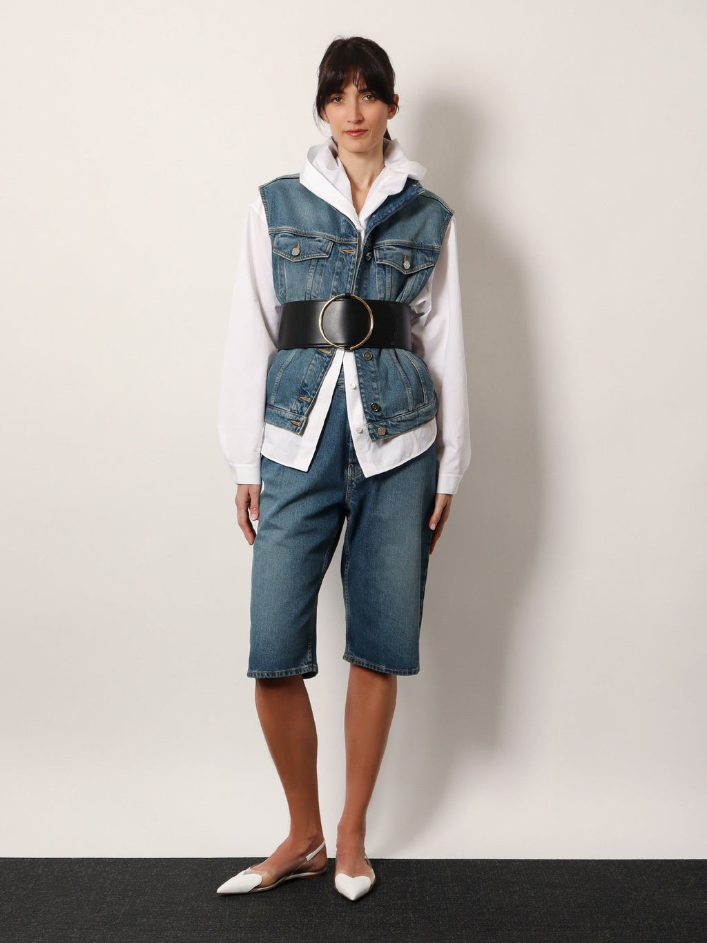 ALAIA Stone washed denim sleeveless jacket