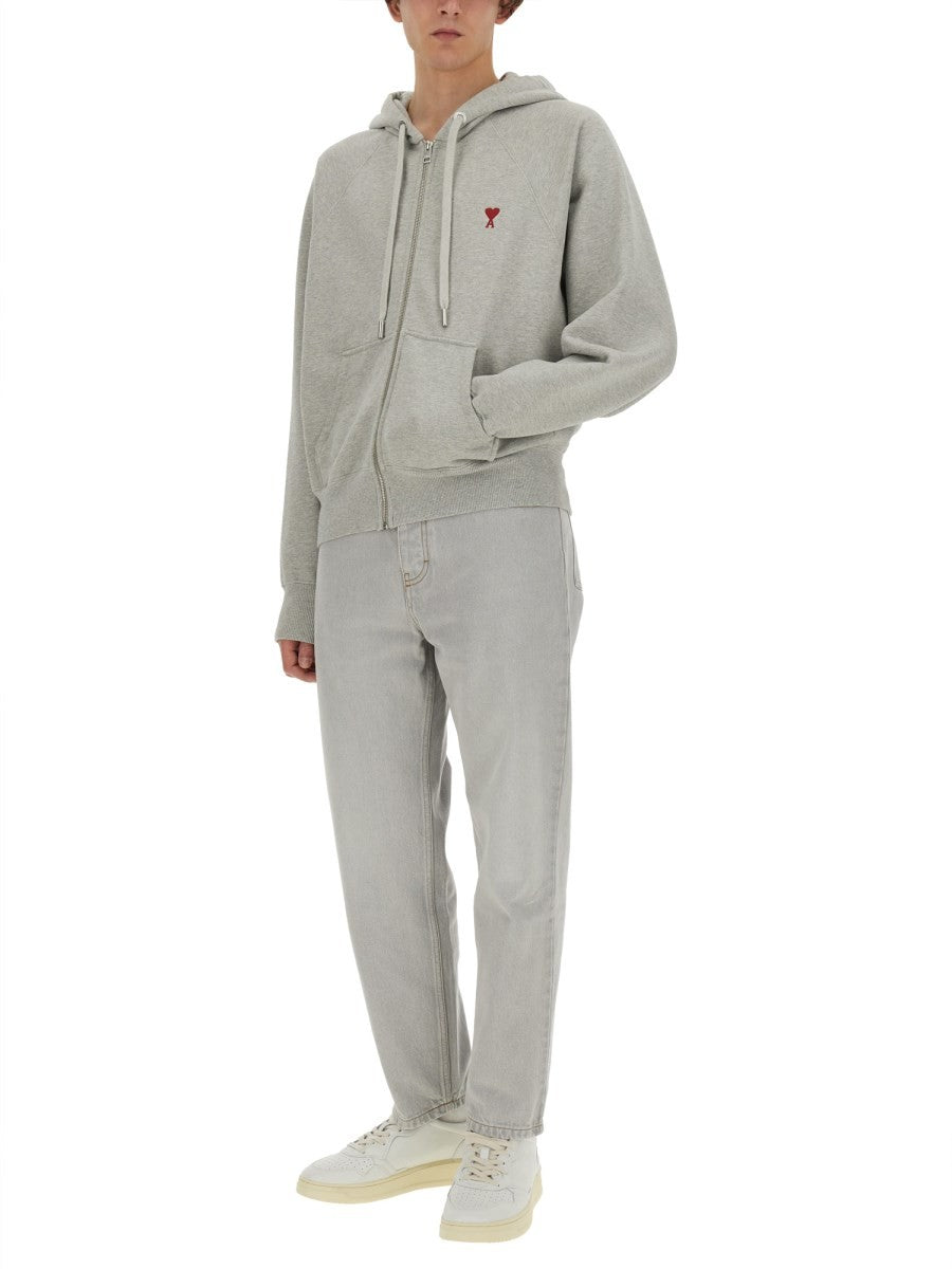 AMI PARIS TAPERED FIT JEANS